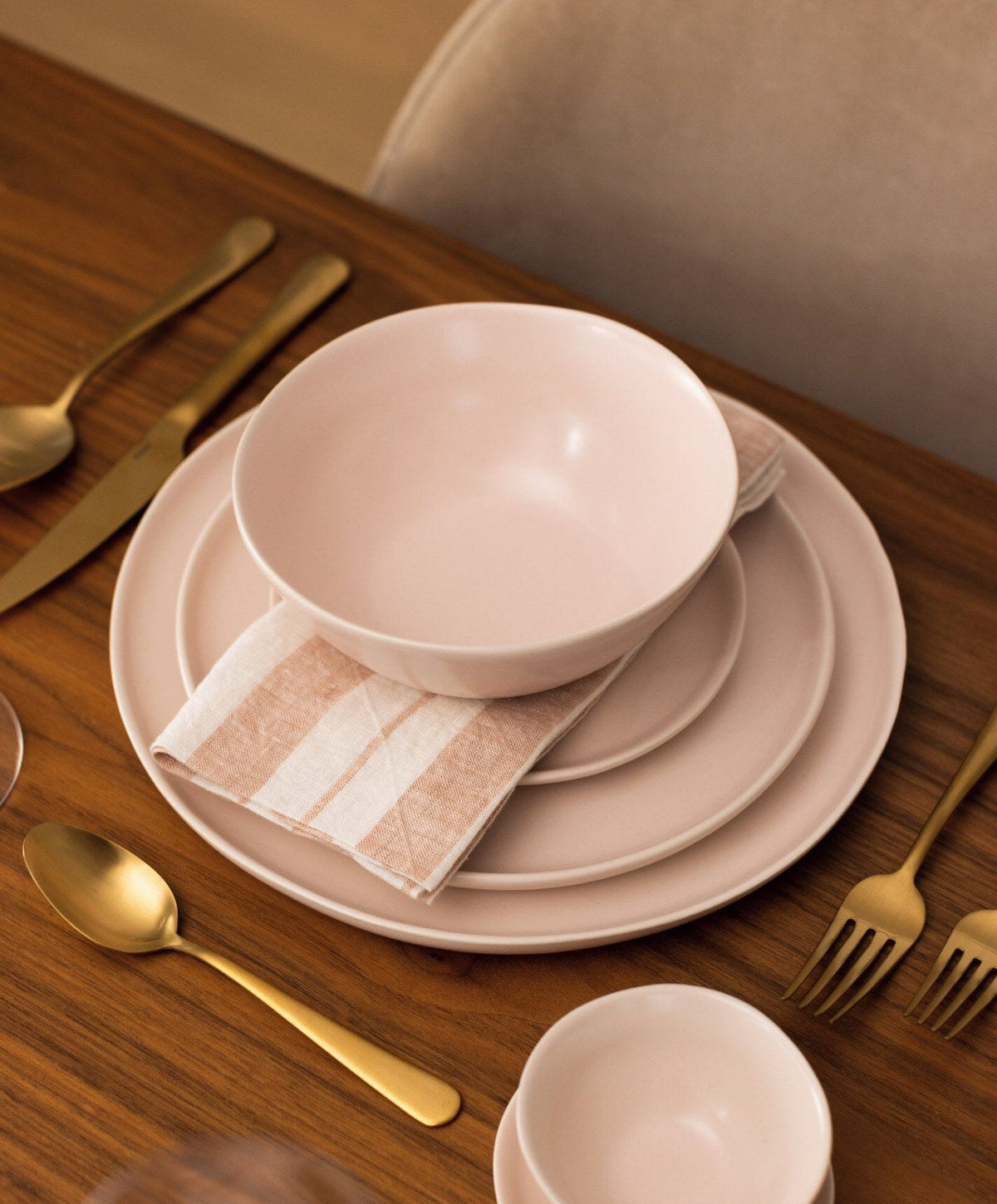 Complete Dinnerware Set by Fable Home, shown in Blush Pink.