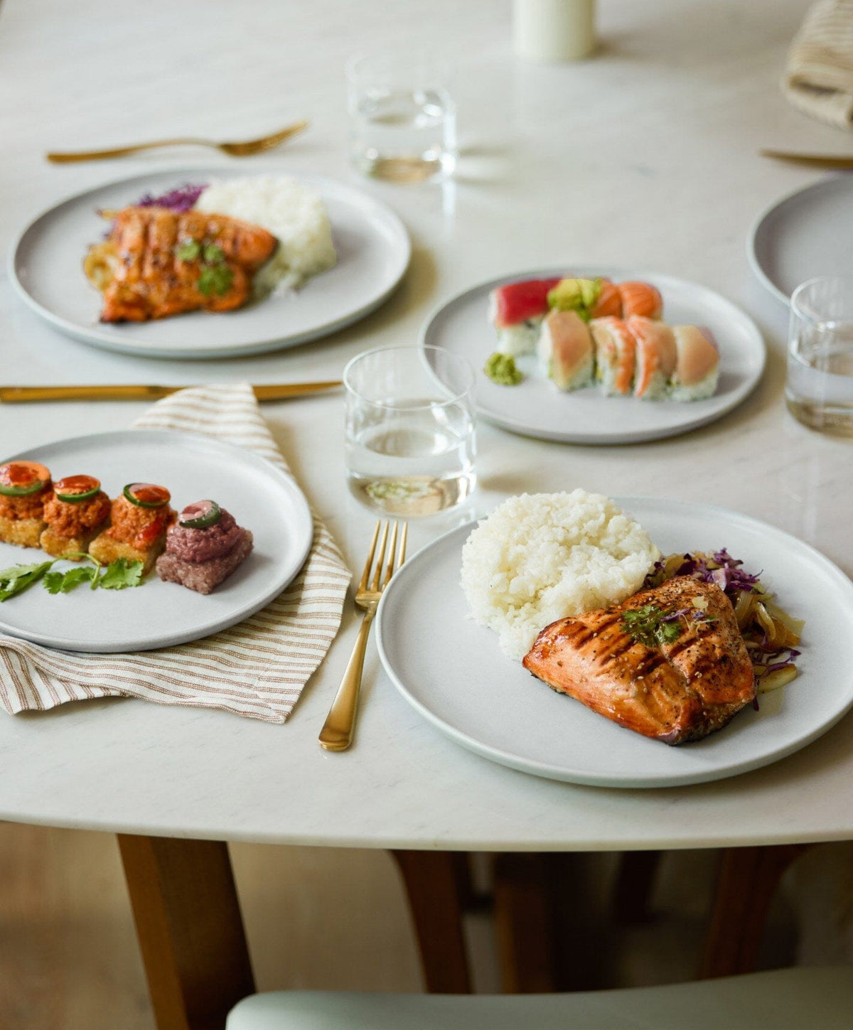 Complete Dinnerware Set by Fable Home, shown in Stone Blue.