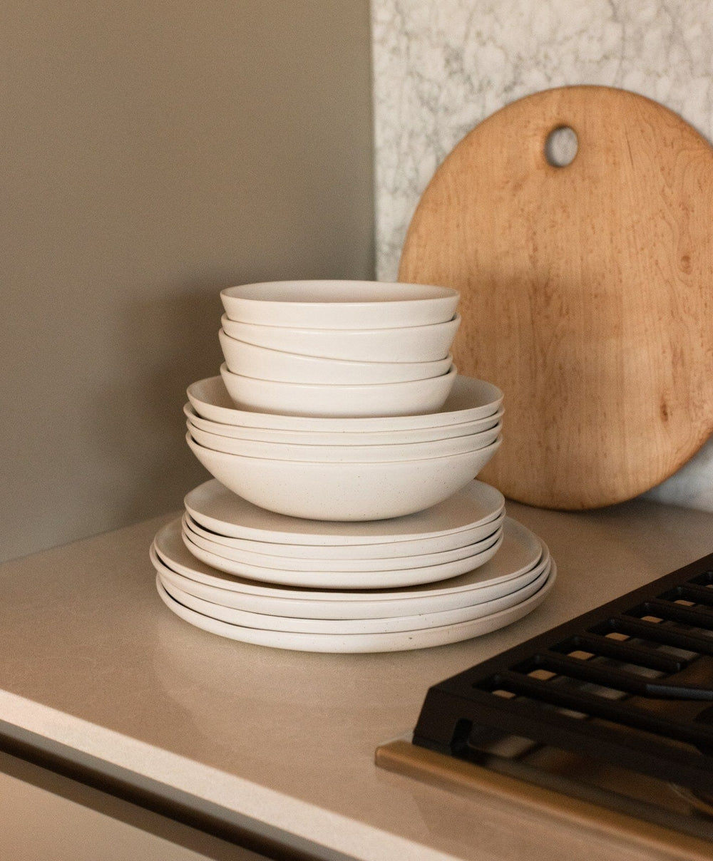 Complete Dinnerware Set by Fable Home, shown in Speckled White.