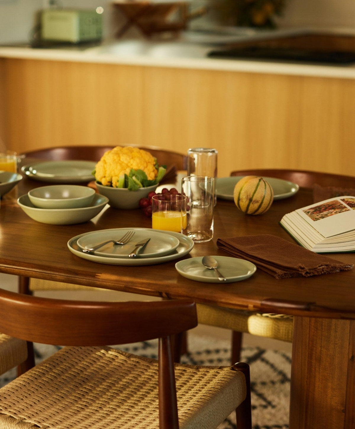 Complete Dinnerware Set by Fable Home, shown in Beachgrass Green.