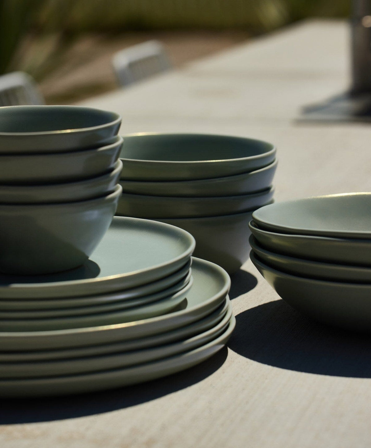 Complete Dinnerware Set by Fable Home, shown in Beachgrass Green.