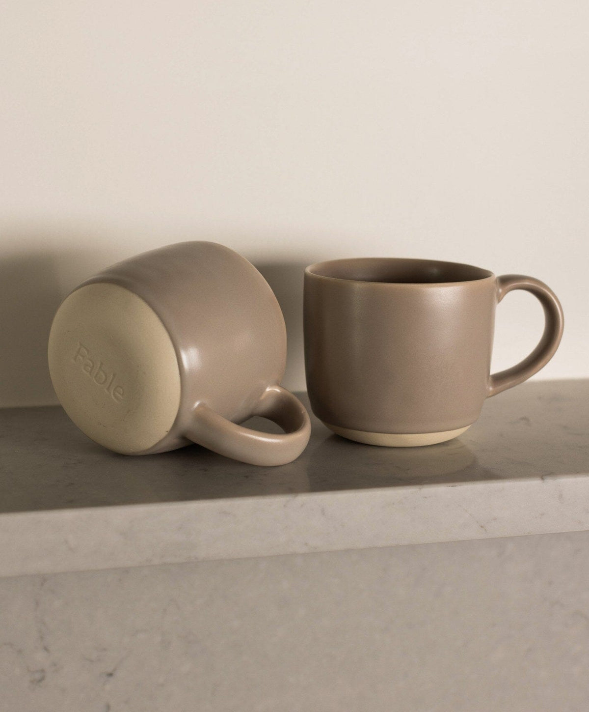 Complete Dinnerware Set by Fable Home, shown in Desert Taupe.
