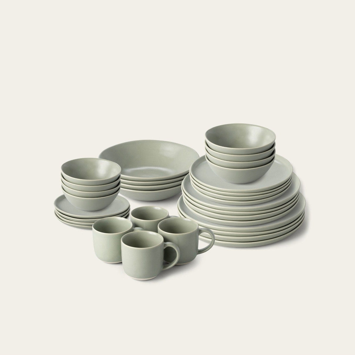 Complete Dinnerware Set by Fable Home, shown in Beachgrass Green.