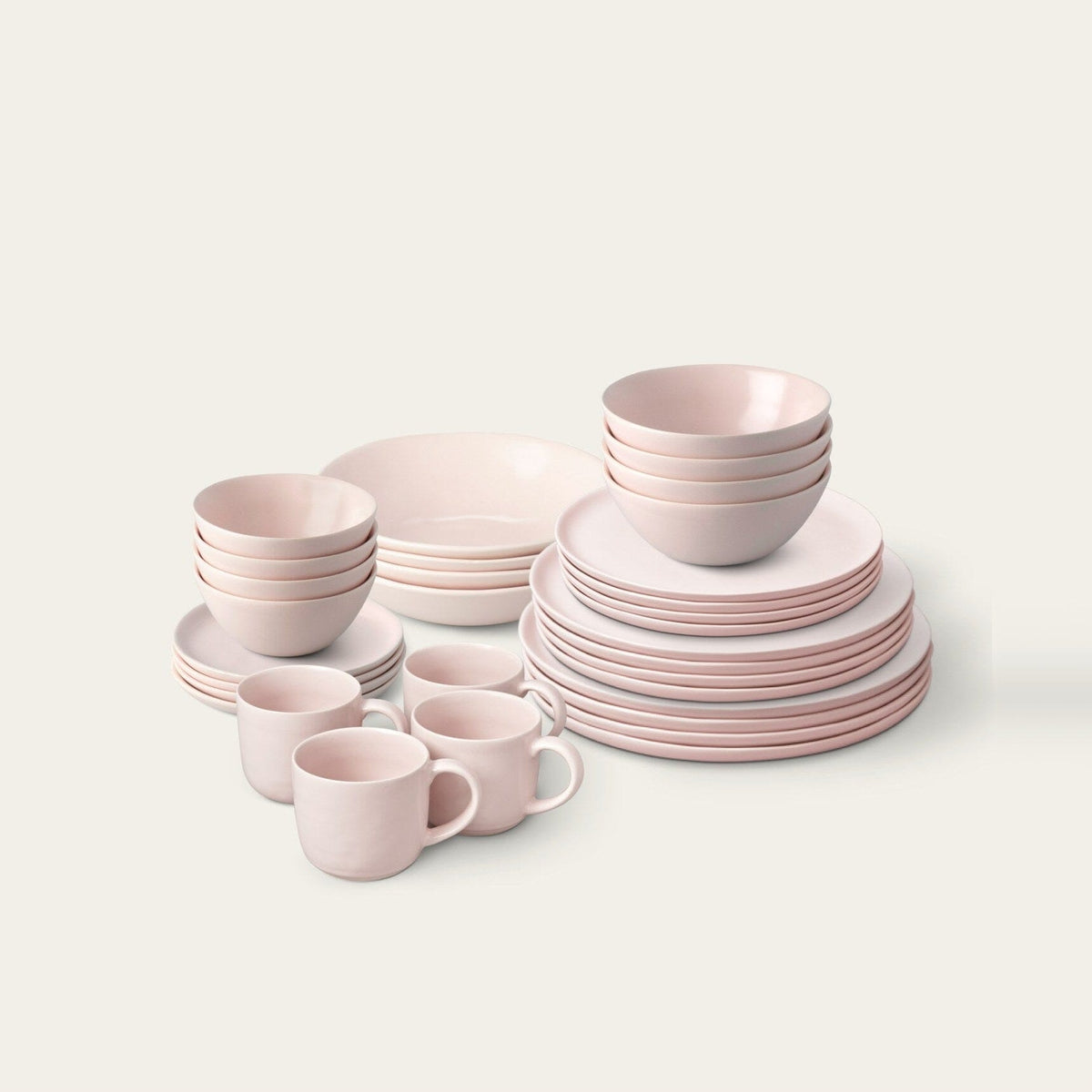 Complete Dinnerware Set by Fable Home, shown in Blush Pink.