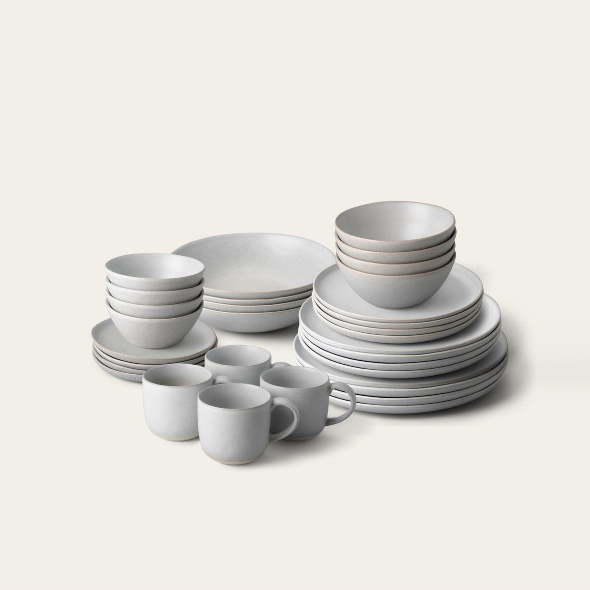 Complete Dinnerware Set by Fable Home, shown in Stone Blue.