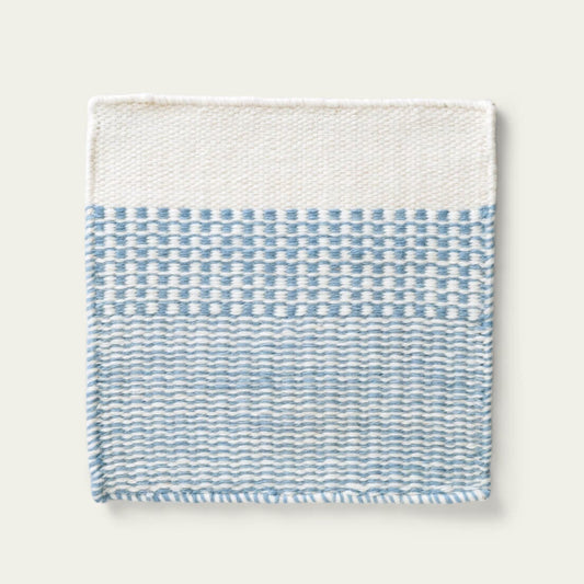 Linear Wool Rug with blue and white pattern on a light gray background, #duskblue