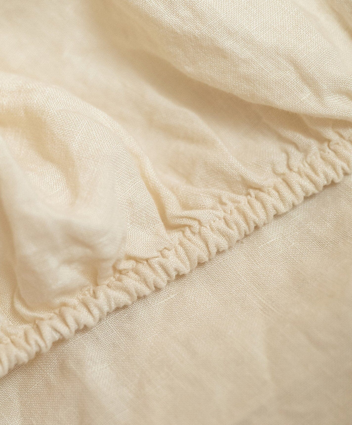 Linen Fitted Sheet by Fable Home, shown in Birch Sand.
