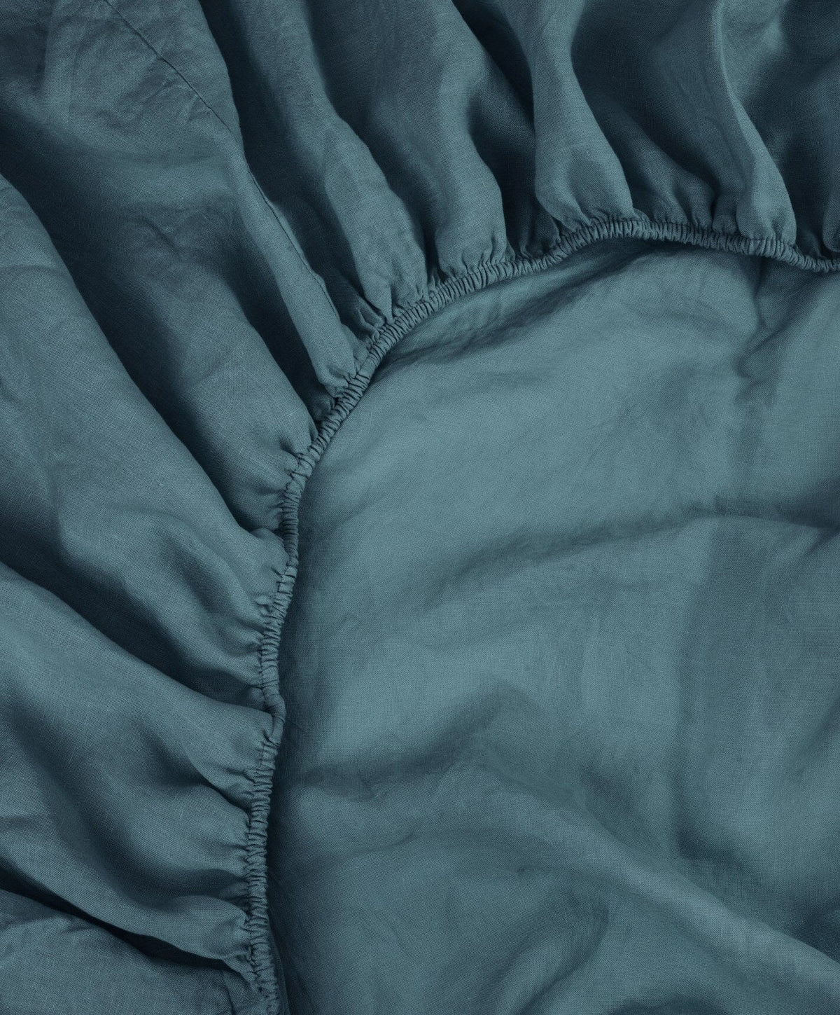 Linen Fitted Sheet by Fable Home, shown in Storm Blue.