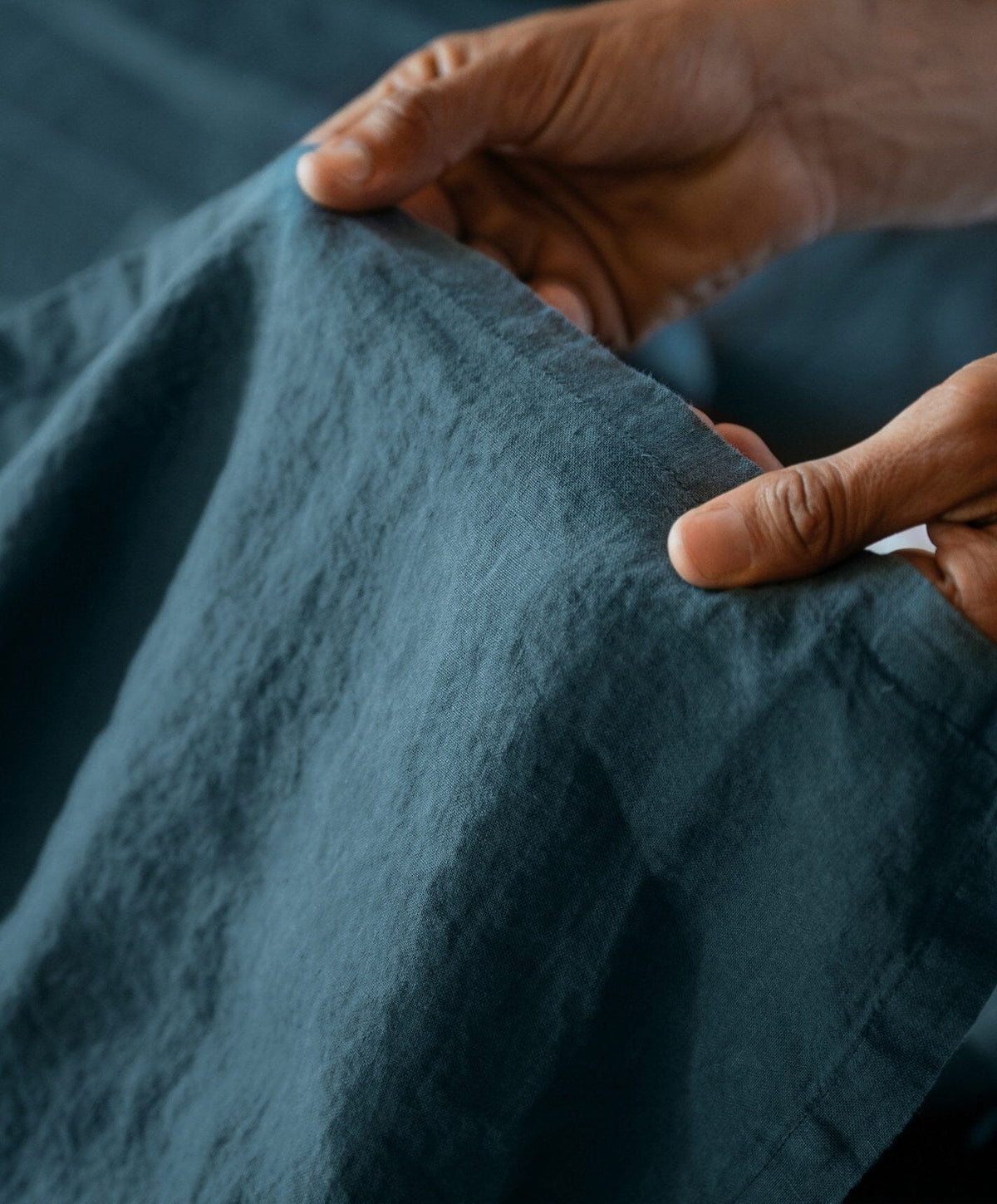 Linen Flat Sheet by Fable Home, shown in Storm Blue.
