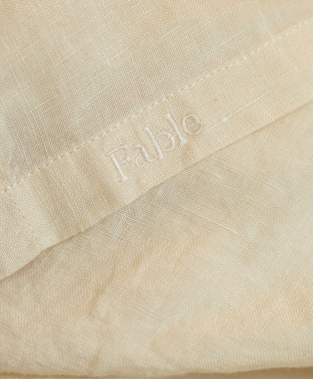 Linen Flat Sheet by Fable Home, shown in Birch Sand.