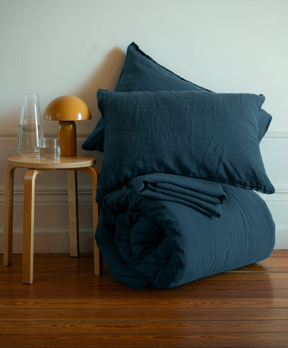 Linen Flat Sheet by Fable Home, shown in Storm Blue.