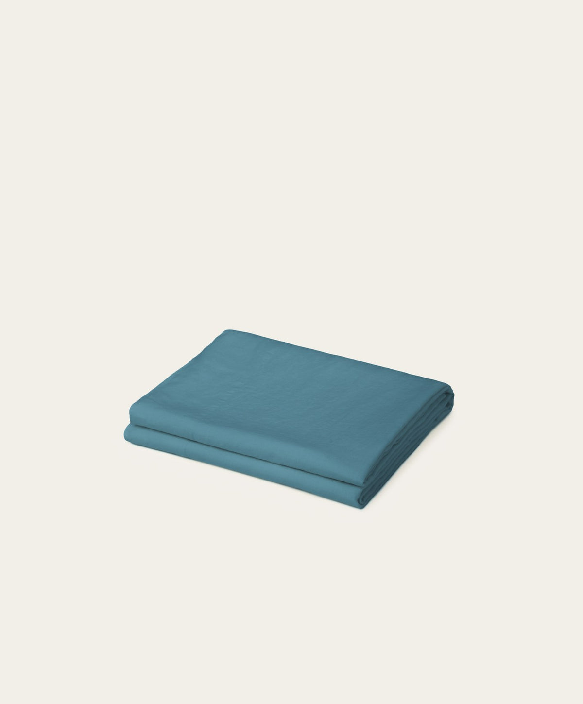 Linen Flat Sheet by Fable Home, shown in Storm Blue.