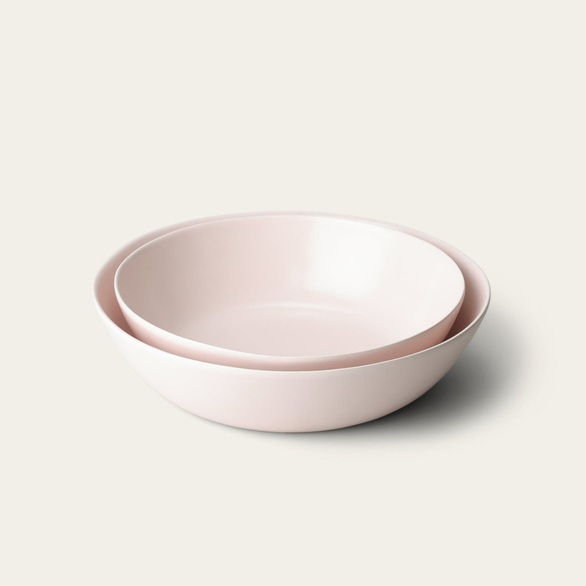 Low serving bowls serveware by Fable Home, shown in a blushpink finish.