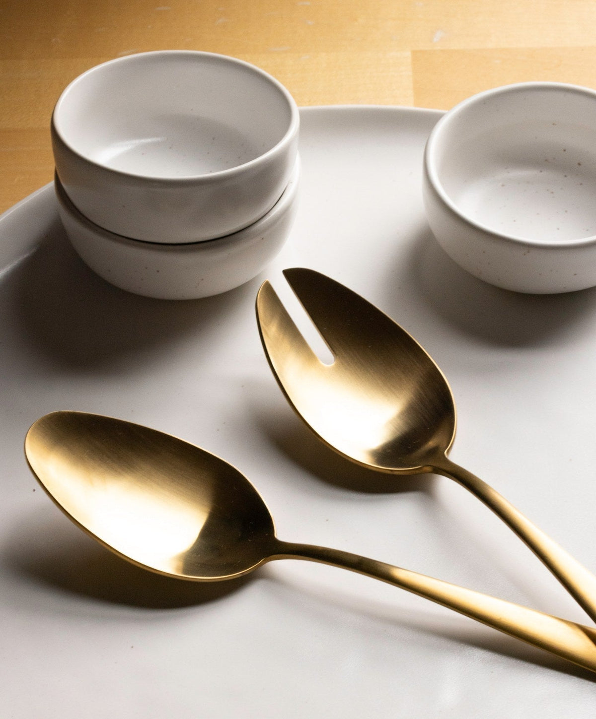Serving Spoons by Fable Home, shown in Matte Gold.