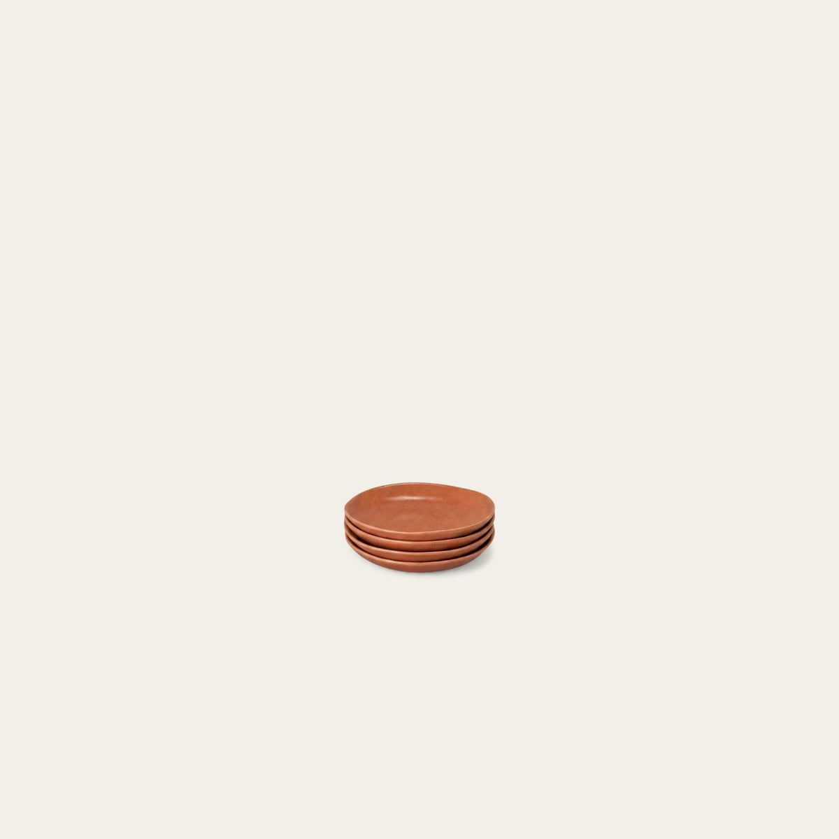 Little Plates by Fable Home, shown in Canyon Clay.