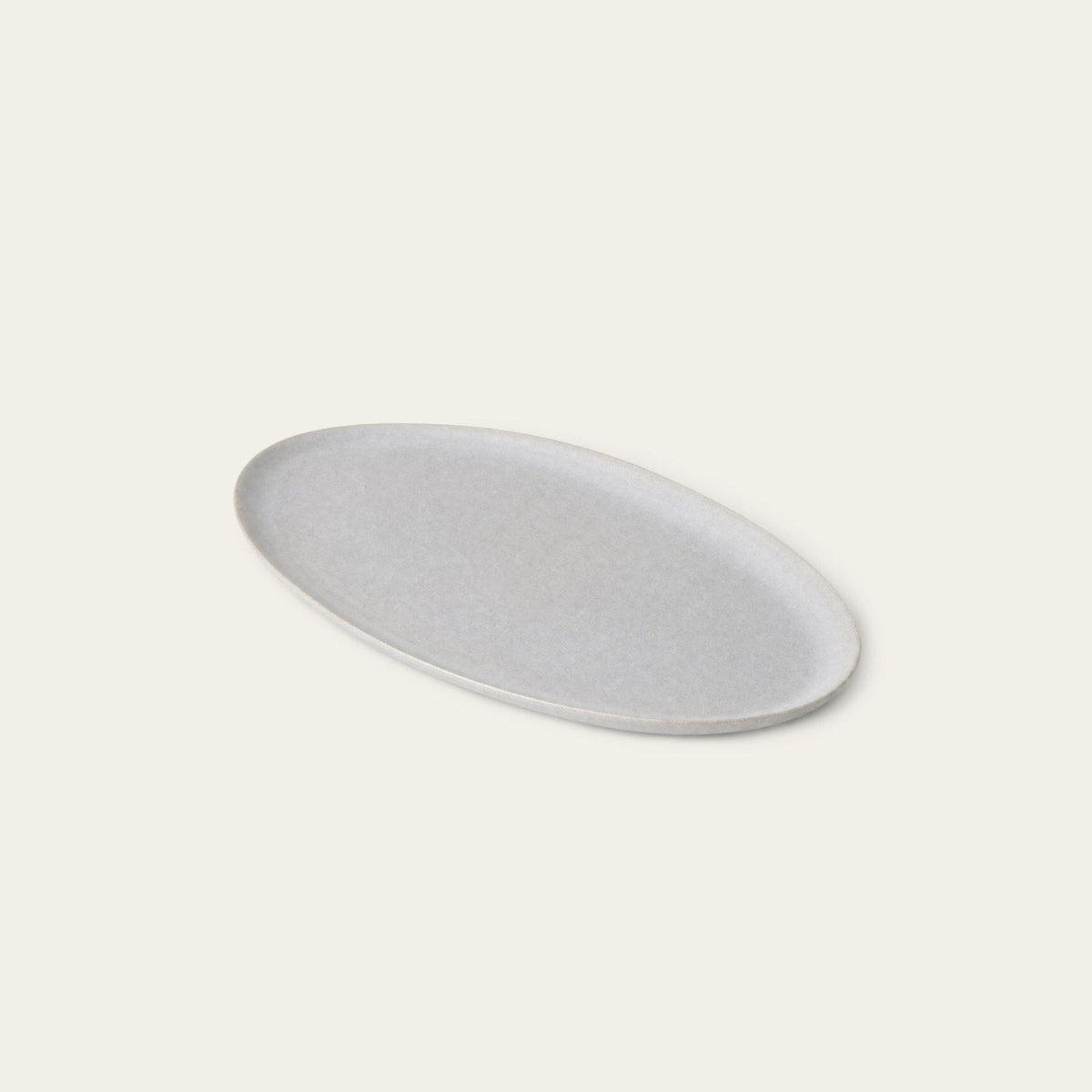 Oval Serving Platter by Fable Home, shown in Stone Blue.