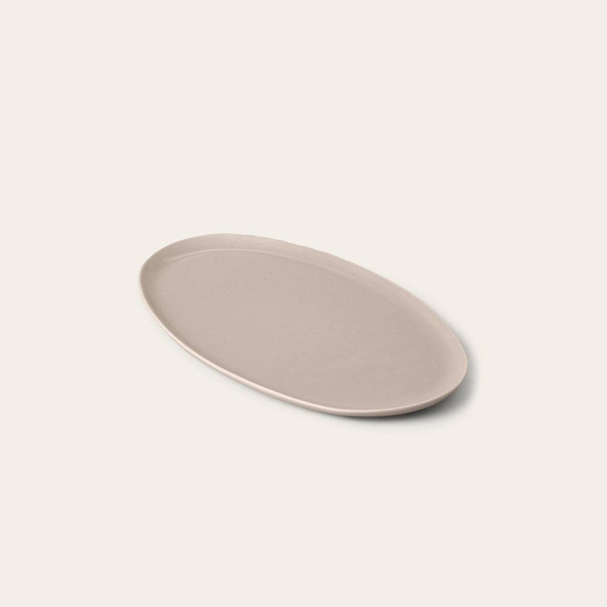 Oval Serving Platter by Fable Home, shown in Desert Taupe.