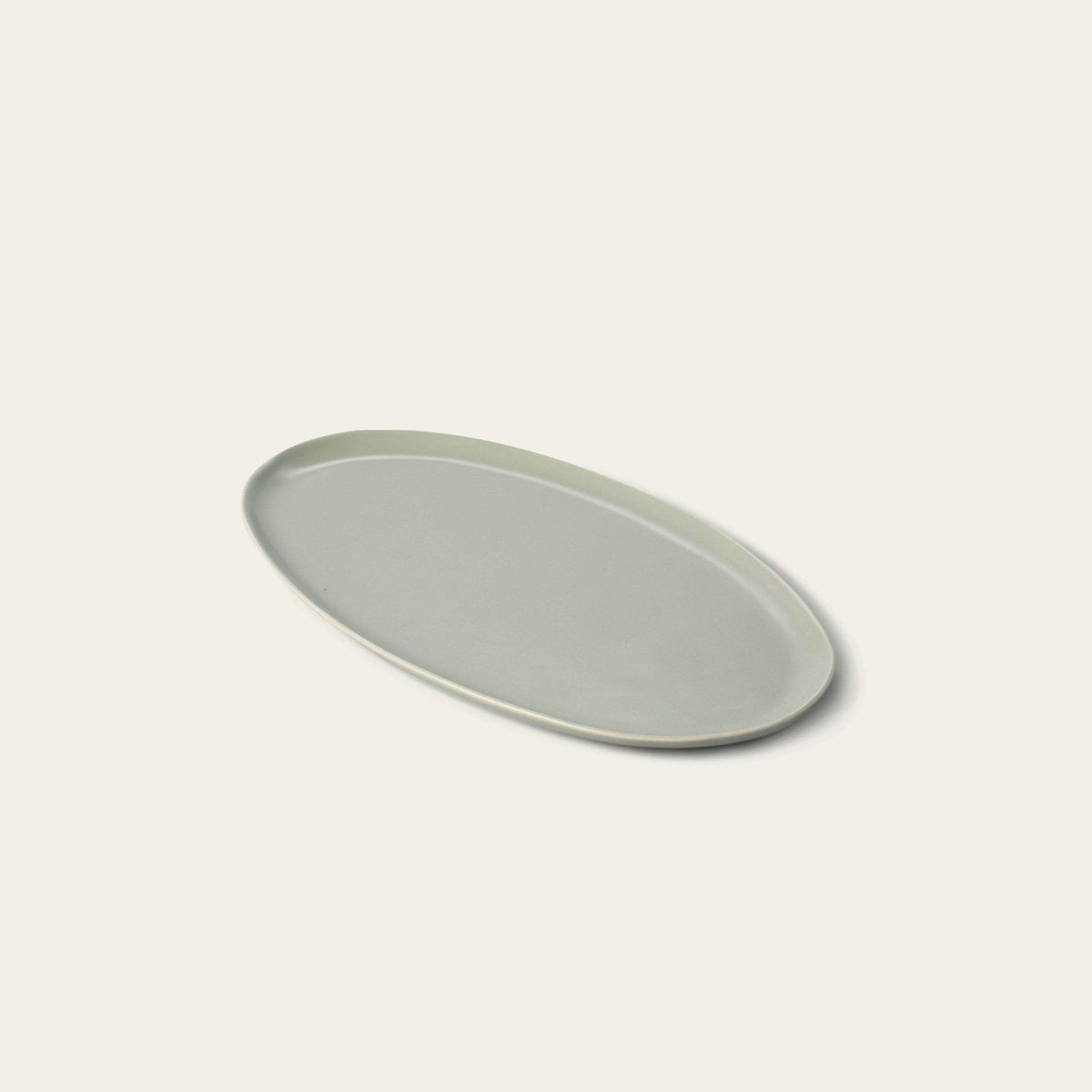 Oval Serving Platter by Fable Home, shown in Beachgrass Green.