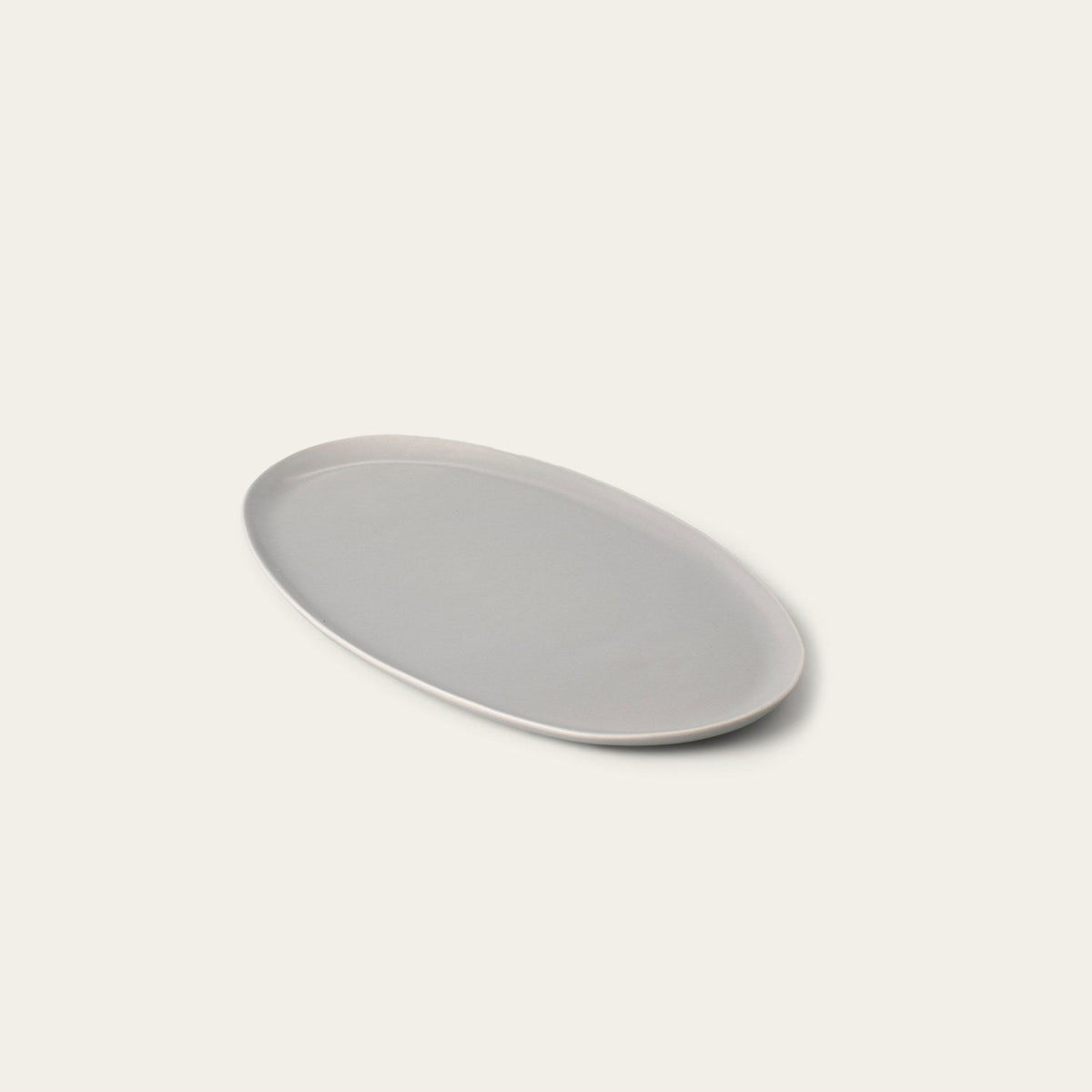 Oval Serving Platter by Fable Home, shown in Dove Gray.