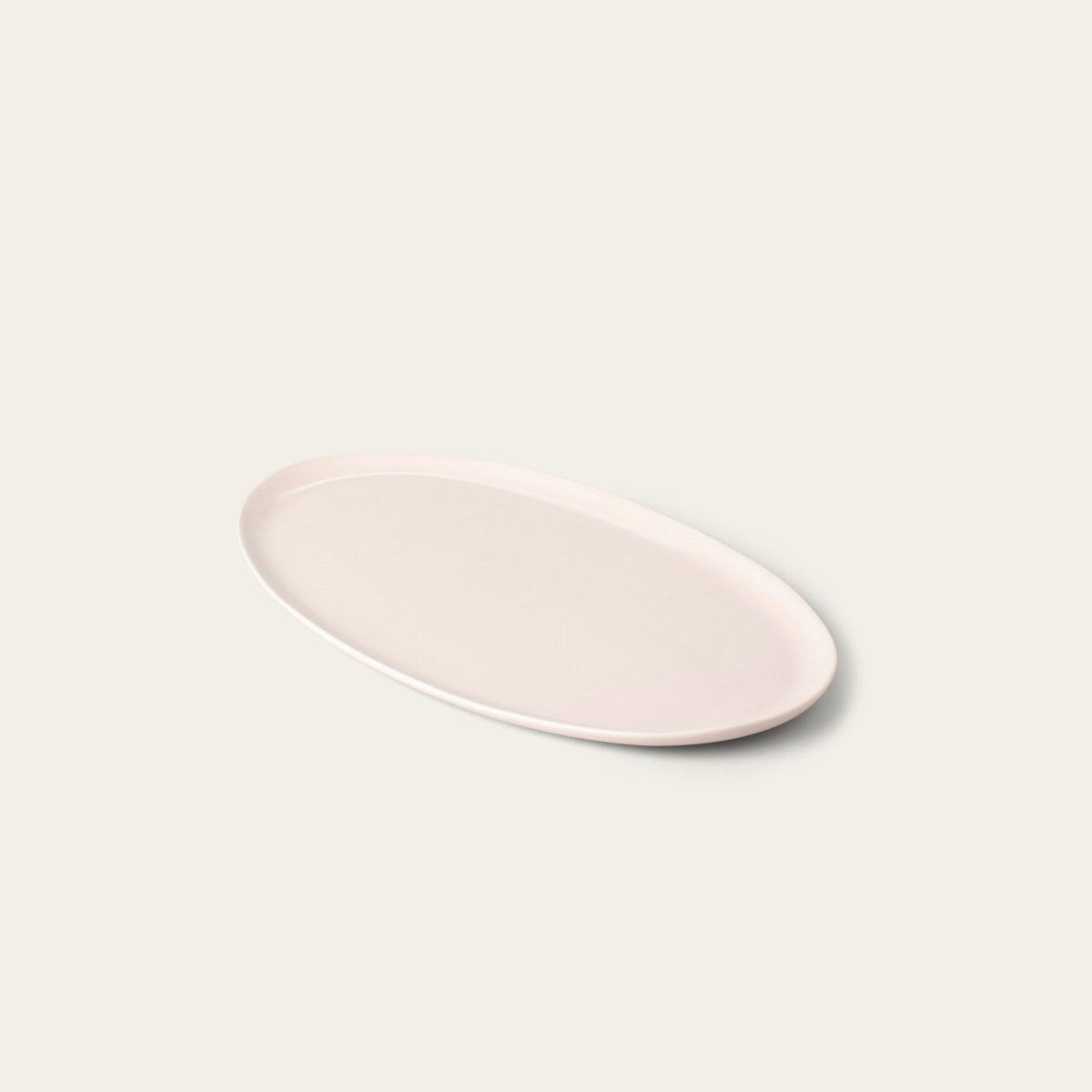 Oval Serving Platter by Fable Home, shown in Blush Pink.