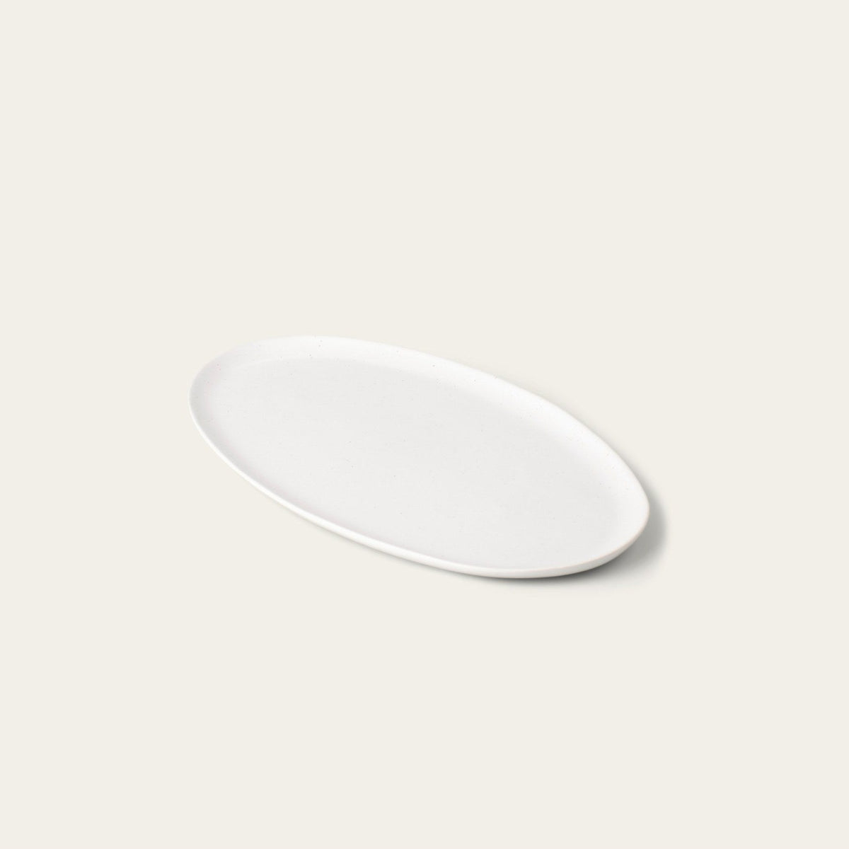 Oval Serving Platter by Fable Home, shown in Speckled White.