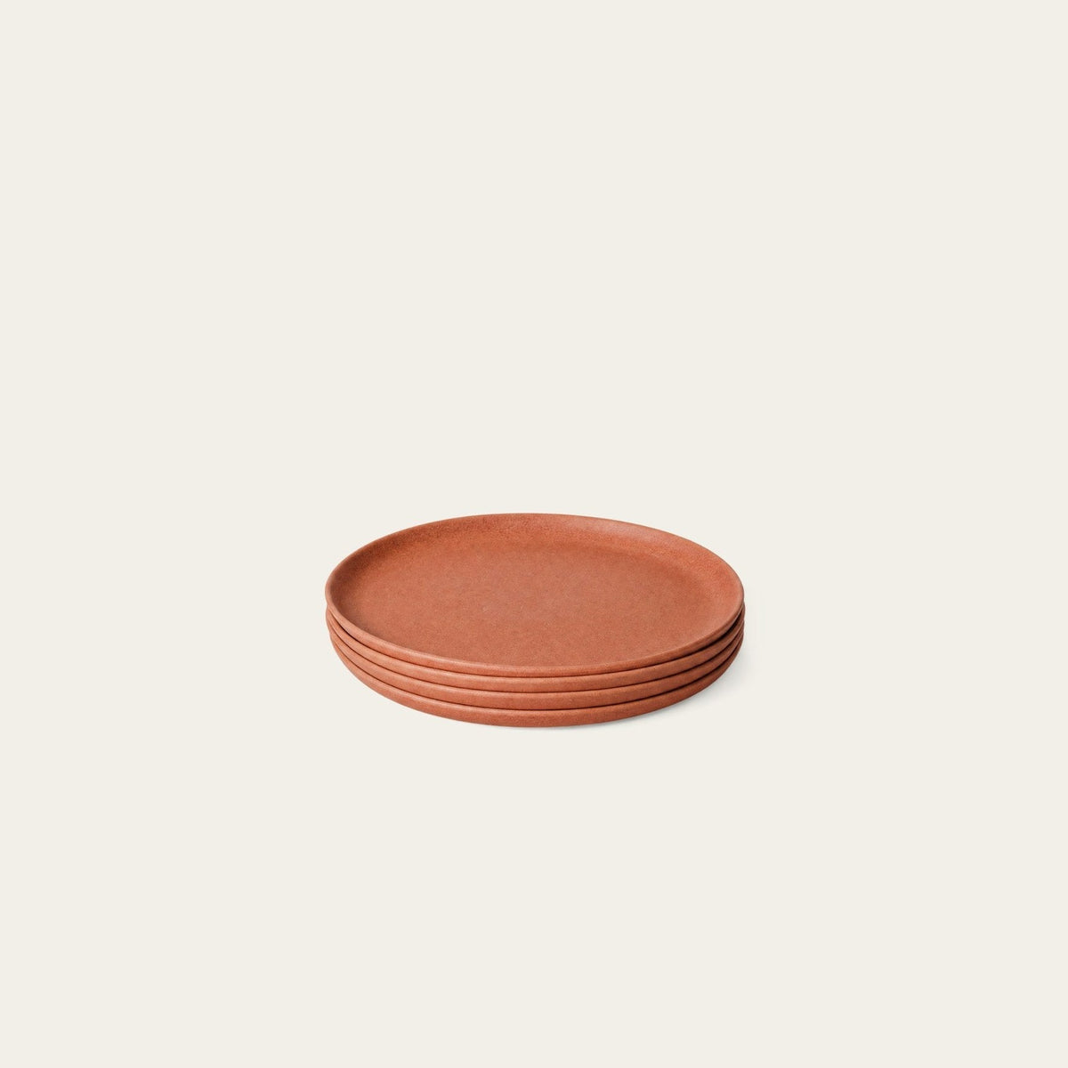 Salad Plates by Fable Home, shown in Canyon Clay.