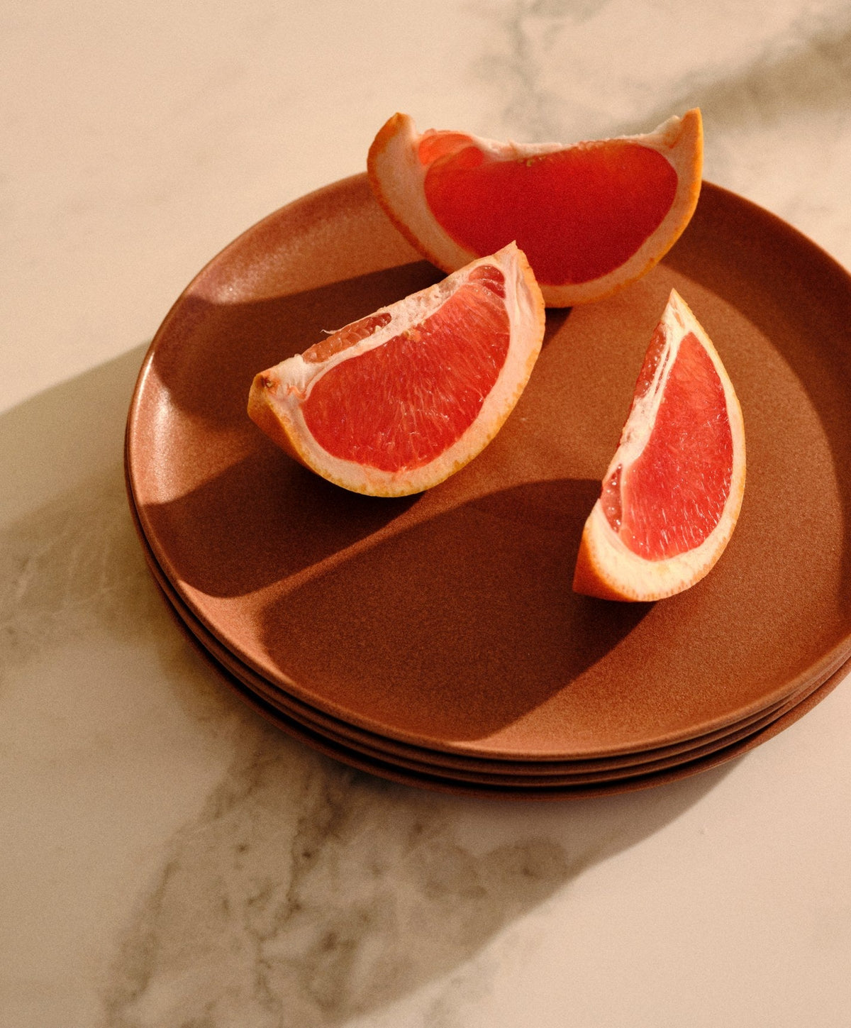 Salad Plates by Fable Home, shown in Canyon Clay.
