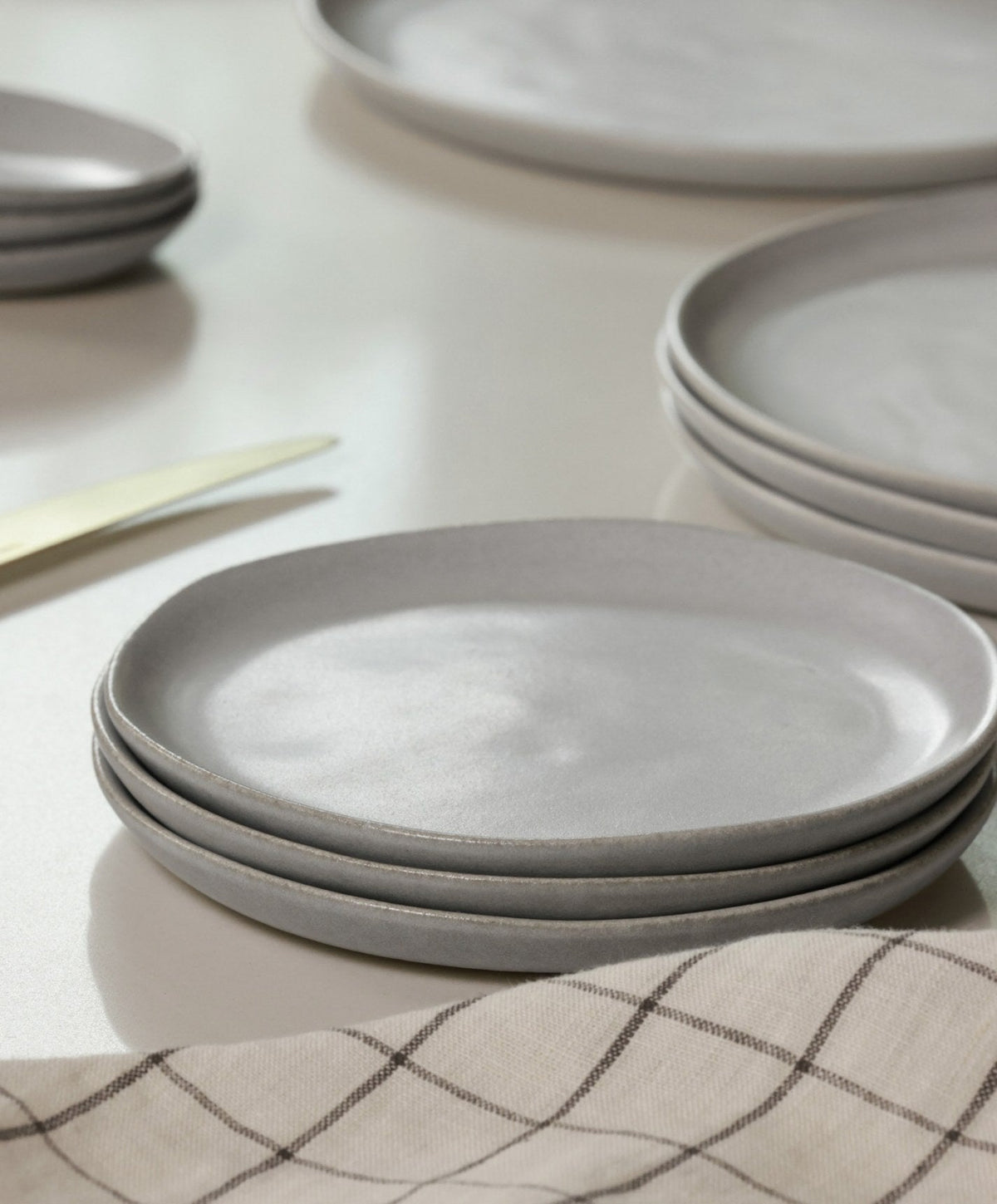 Salad Plates by Fable Home, shown in Stone Blue.