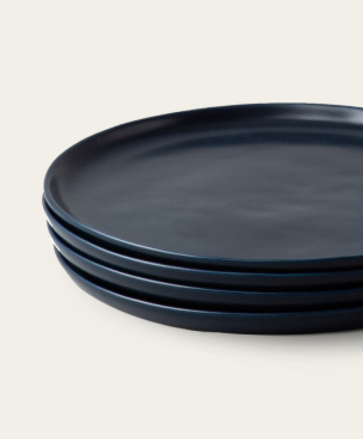 Salad Plates by Fable Home, shown in Midnight Blue.