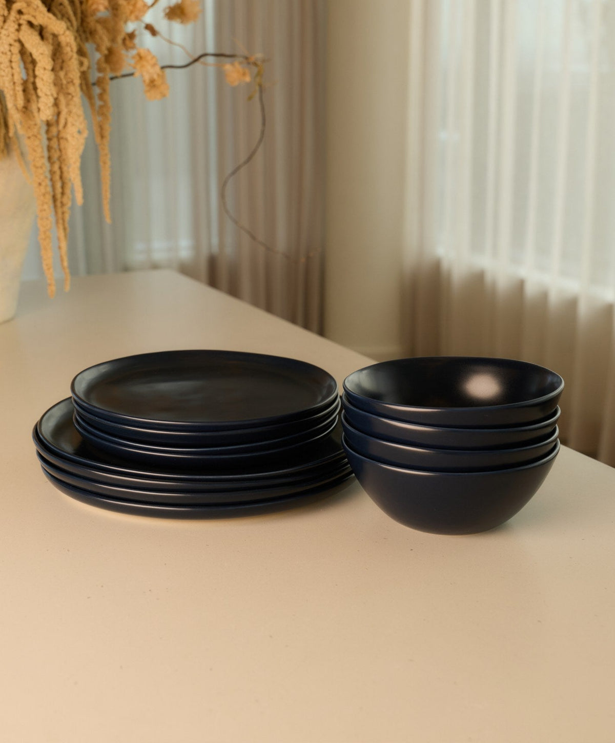 Salad Plates by Fable Home, shown in Midnight Blue.