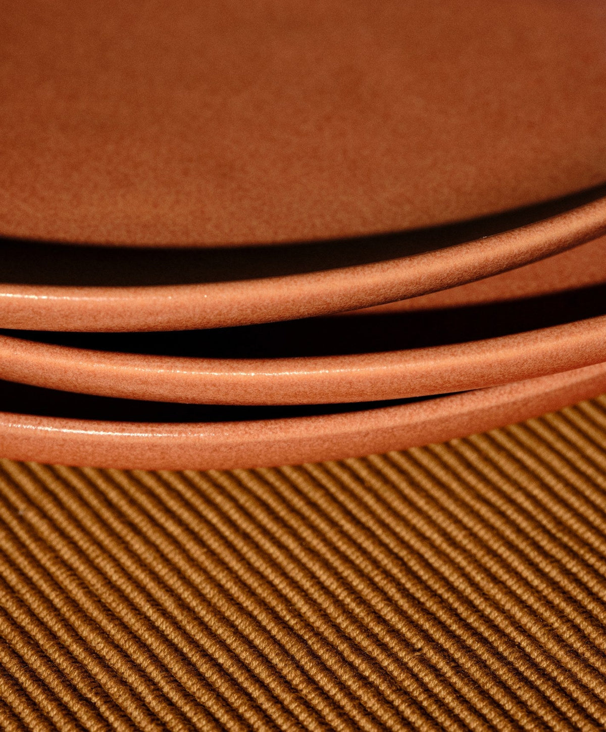 Dinner Plates by Fable Home, shown in Canyon Clay.