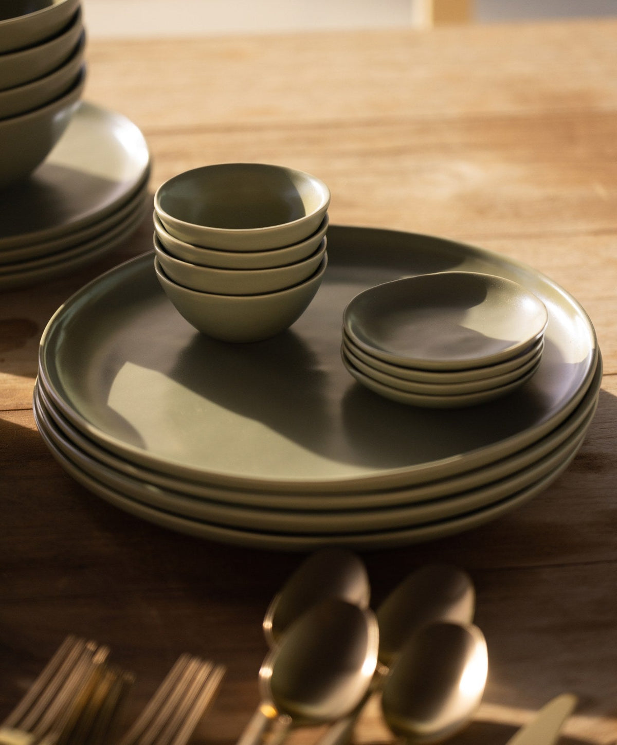 Dinner Plates by Fable Home, shown in Beachgrass Green.