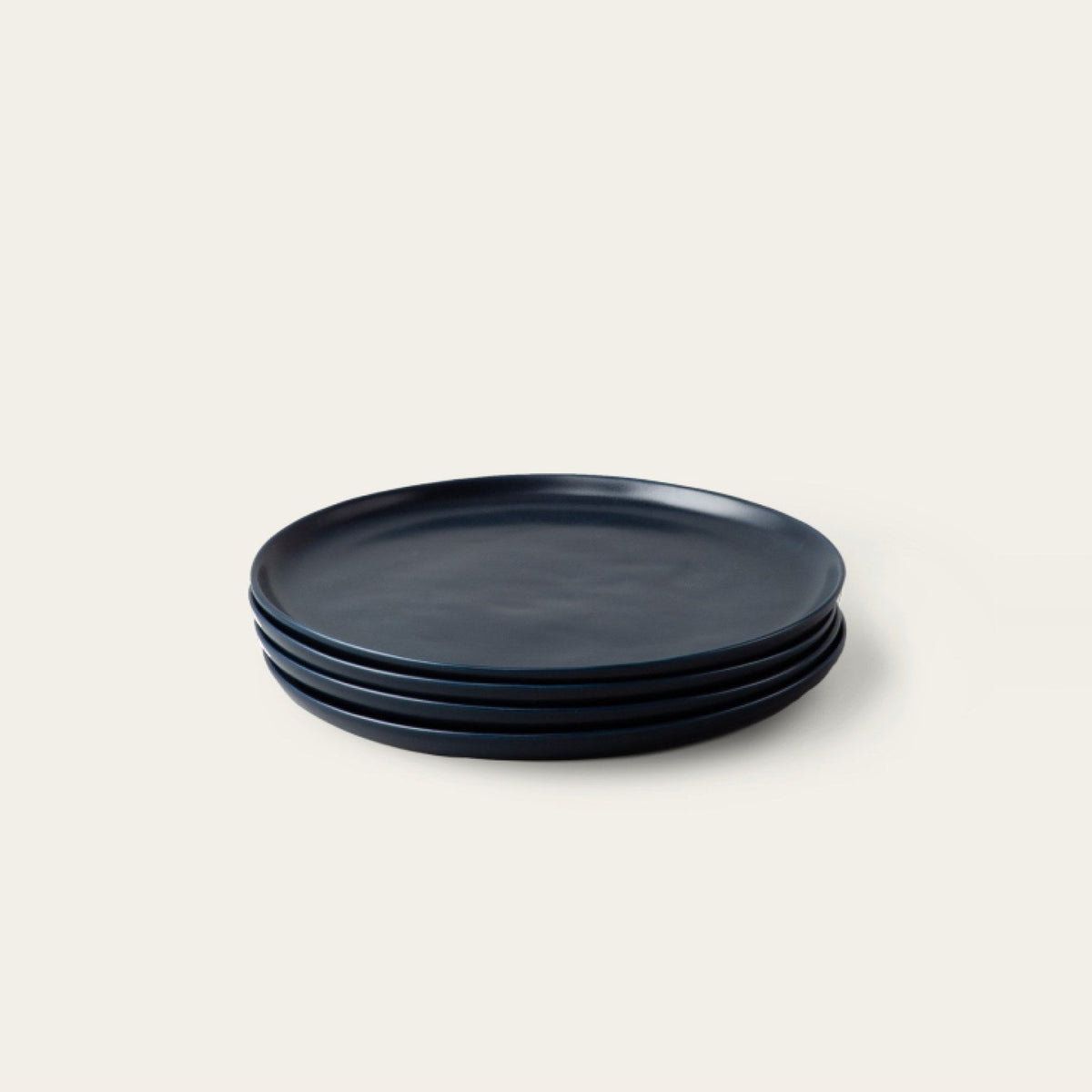 Dinner Plates by Fable Home, shown in Midnight Blue.