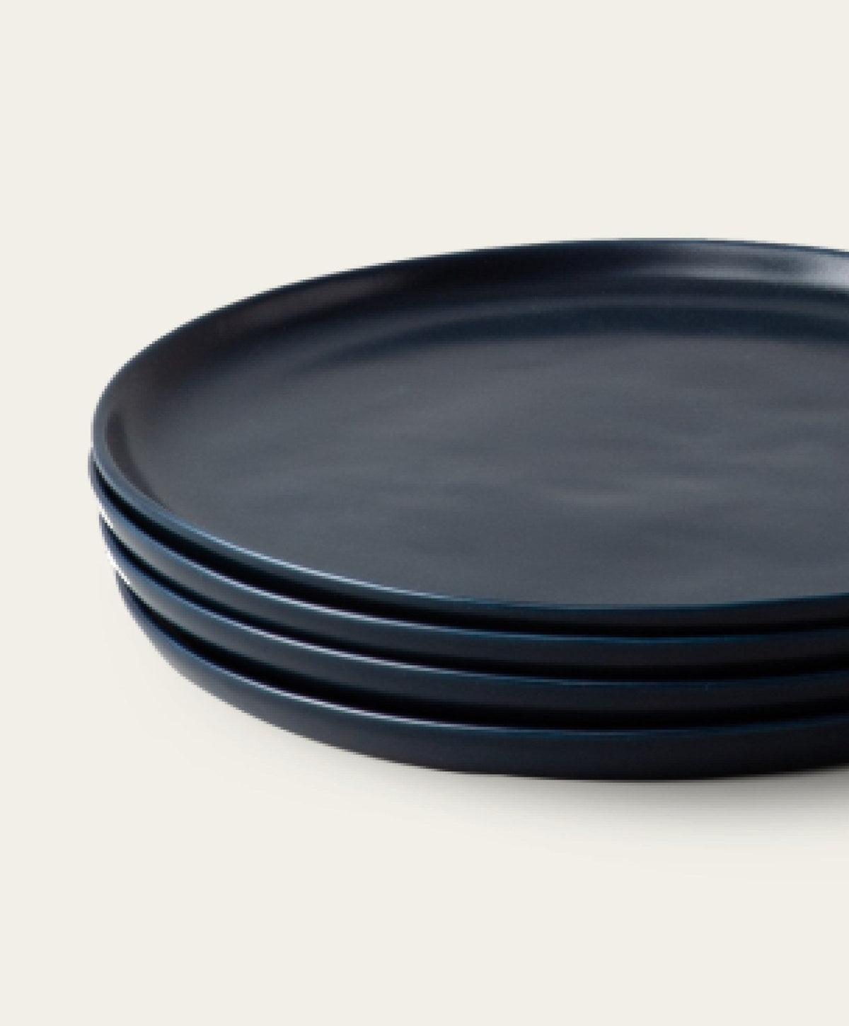 Dinner Plates by Fable Home, shown in Midnight Blue.