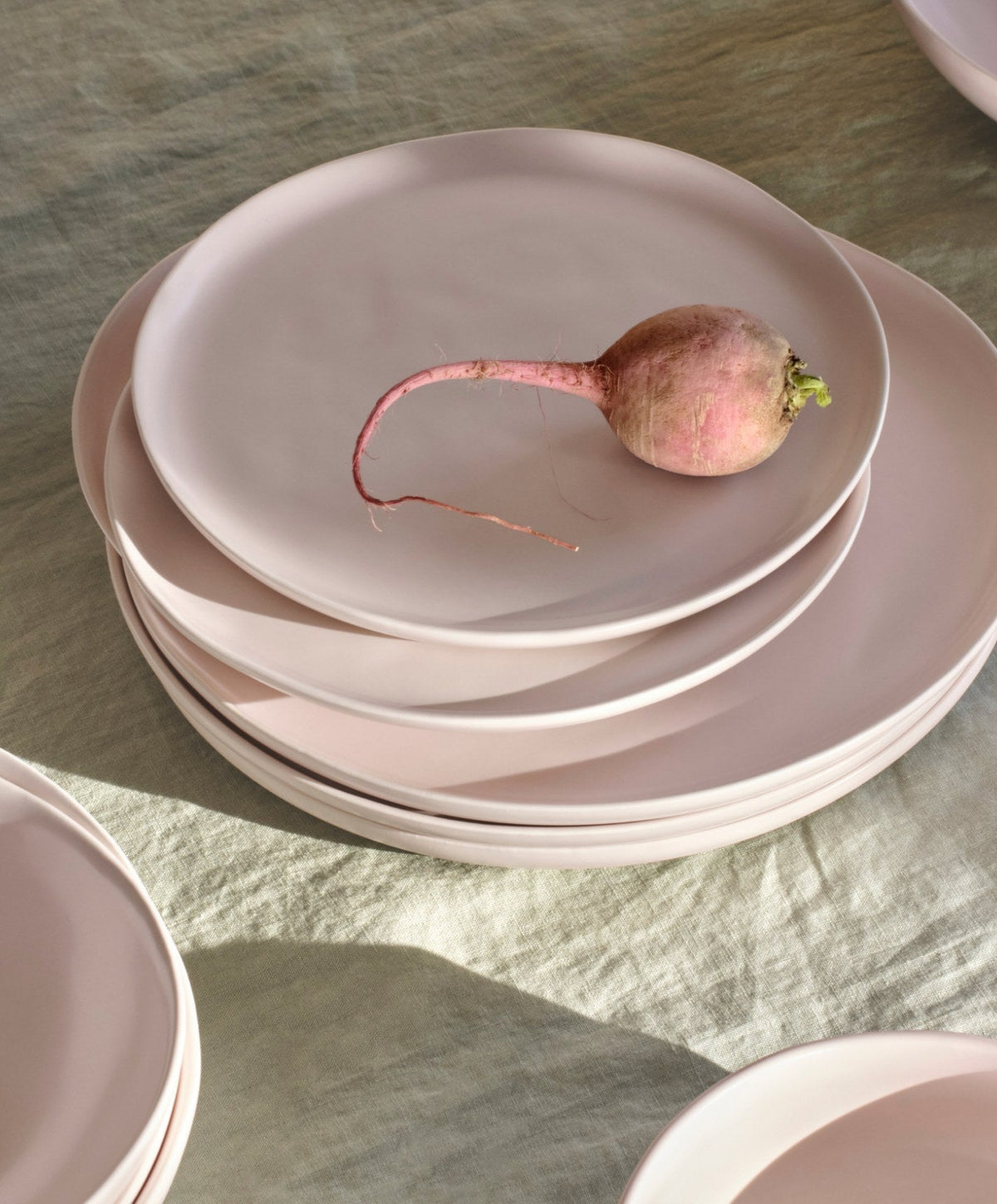 Dinner Plates by Fable Home, shown in Blush Pink.