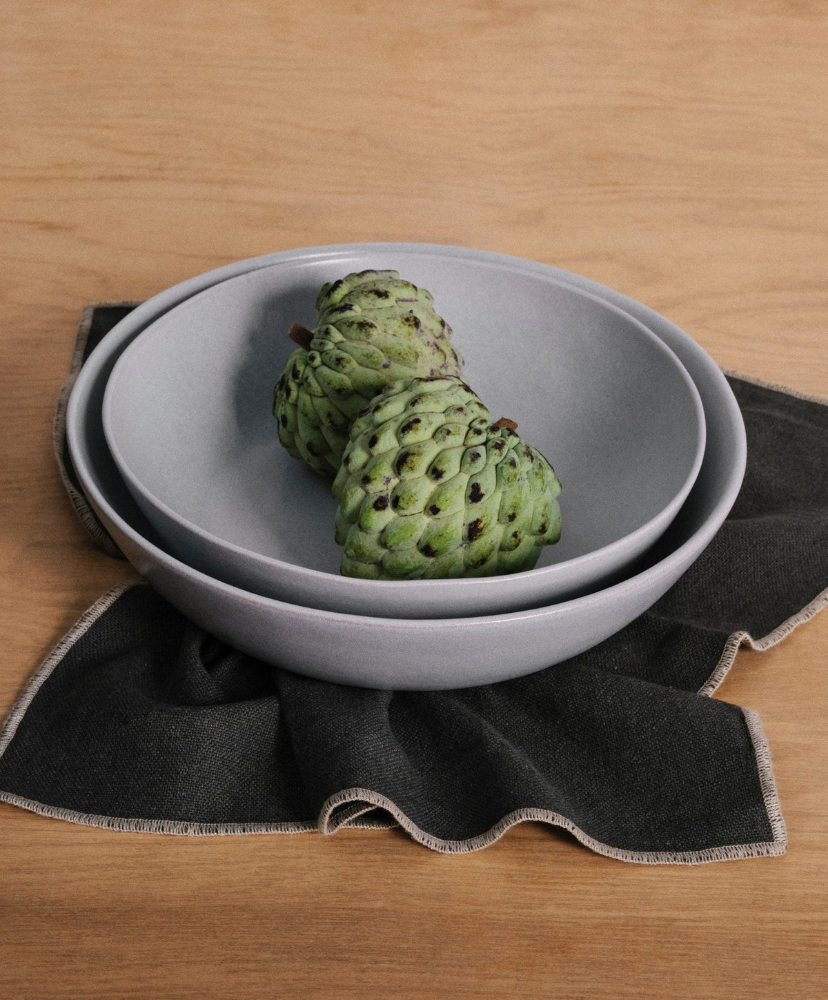 Low Serving Bowls by Fable Home, shown in Stone Blue.