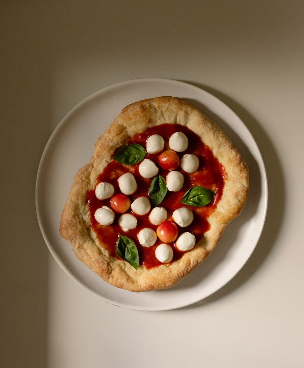 Lunch Plates by Fable Home, shown in Speckled White.