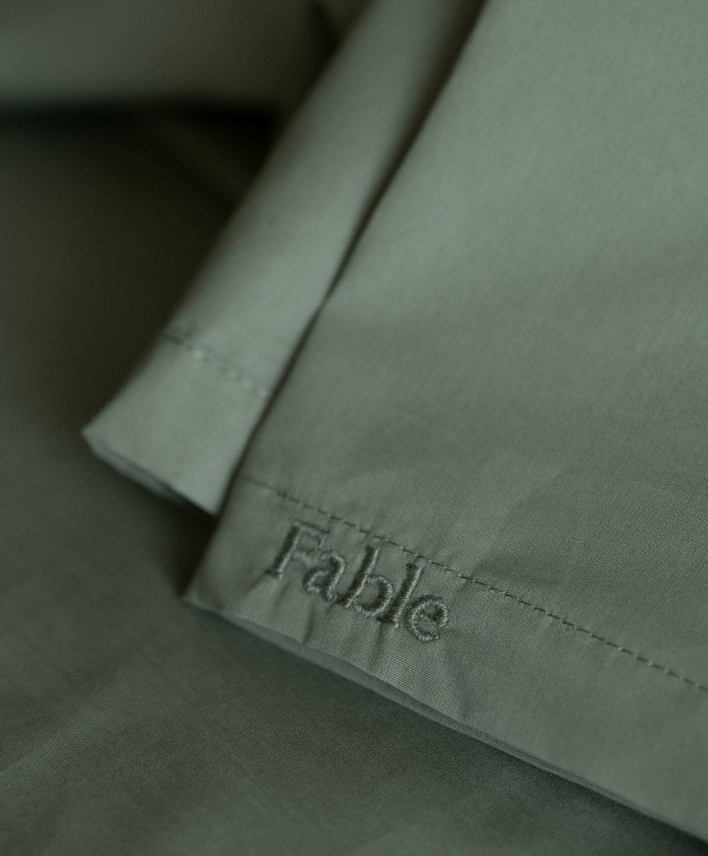 Percale Complete Bed Set by Fable Home, shown in Juniper Green.