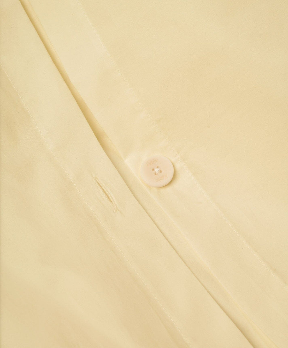 Percale Duvet Cover by Fable Home, shown in Buttercup Yellow.