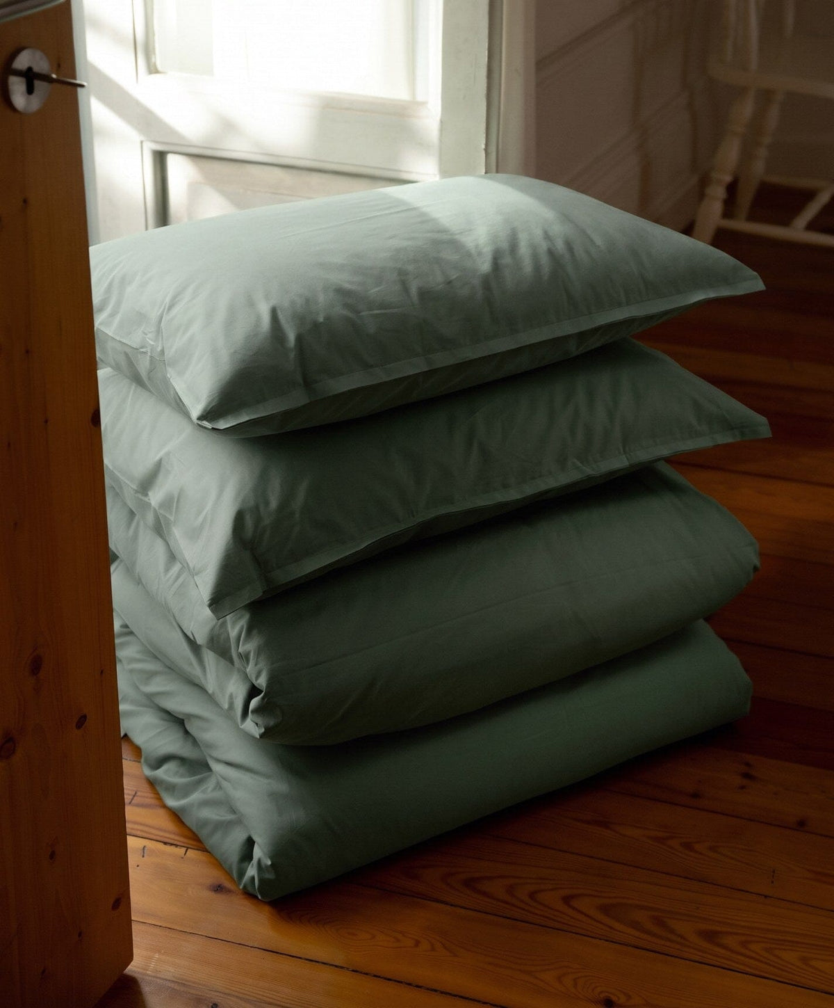 Percale Duvet Set by Fable Home, shown in Juniper Green.