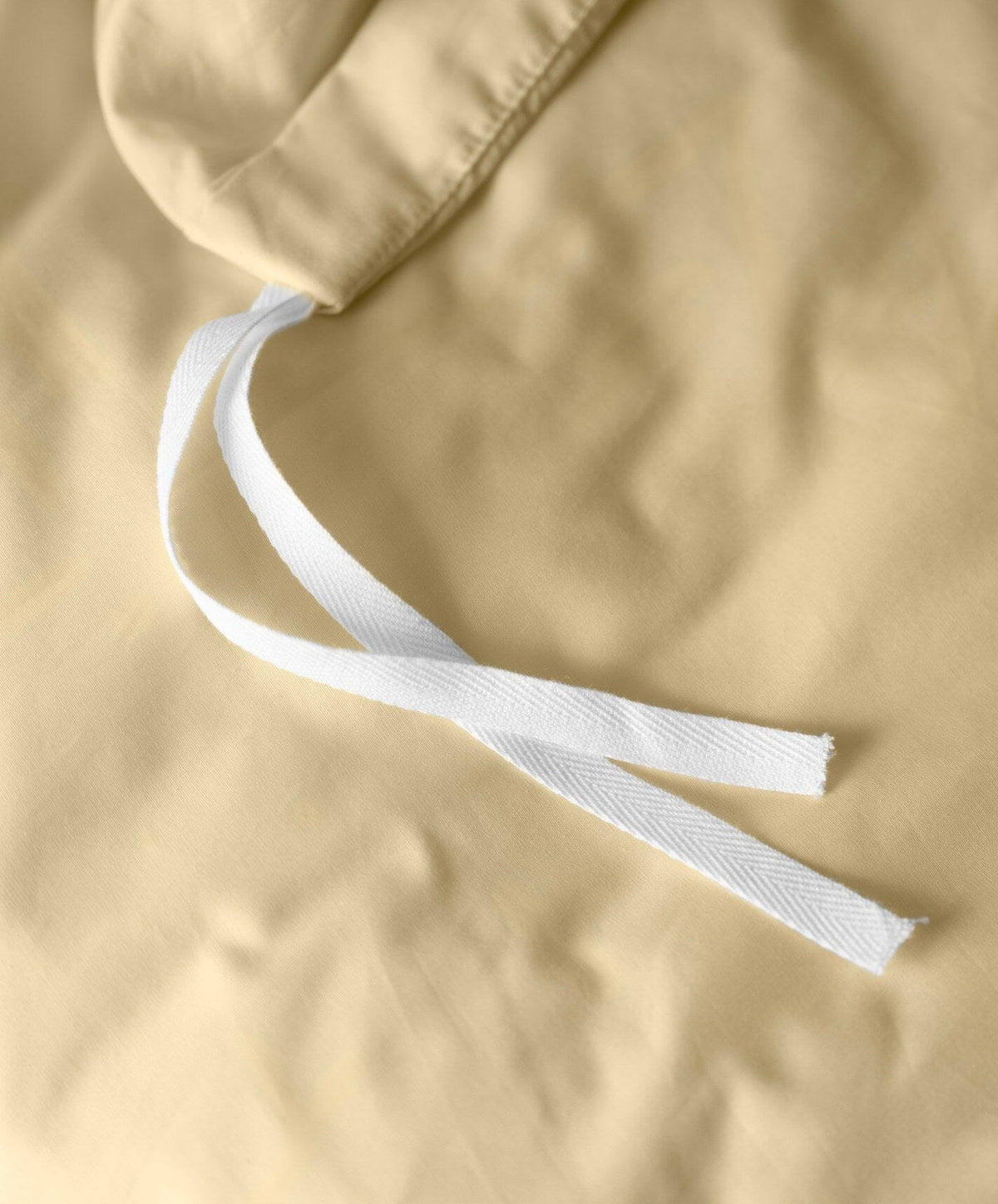 Percale Duvet Set by Fable Home, shown in Buttercup Yellow.