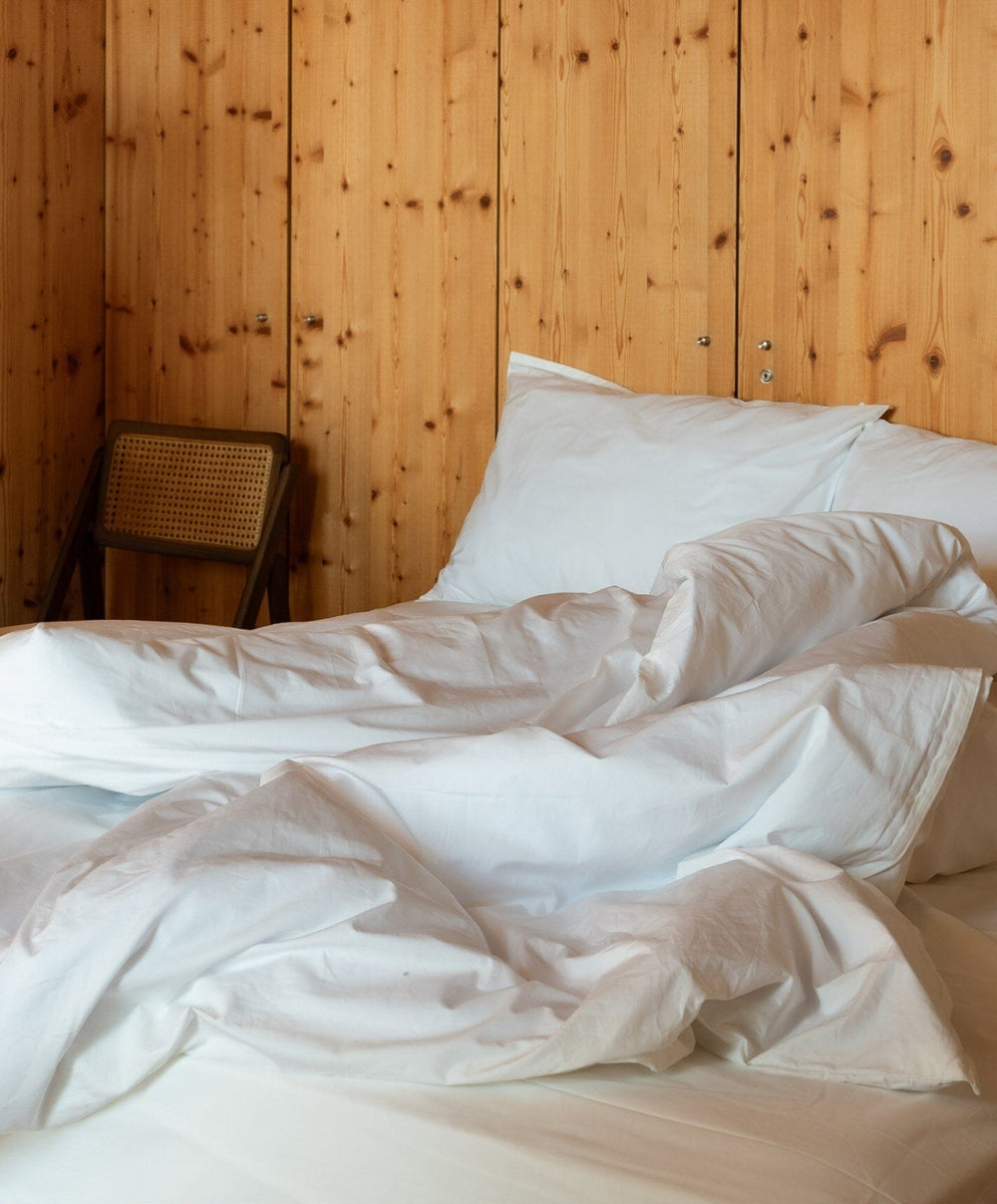 Percale Duvet Set by Fable Home, shown in Shell White.