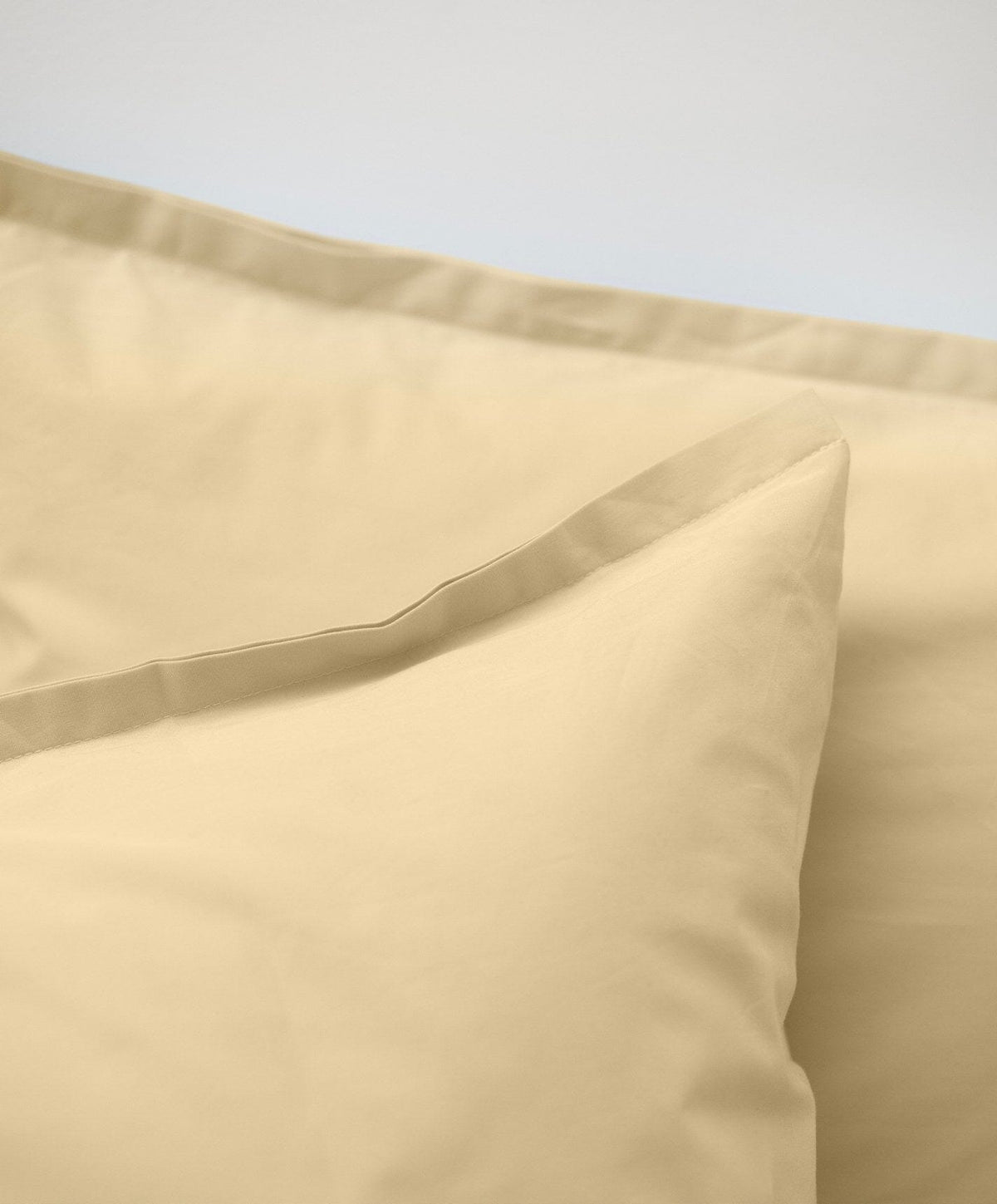 Percale Duvet Set by Fable Home, shown in Buttercup Yellow.