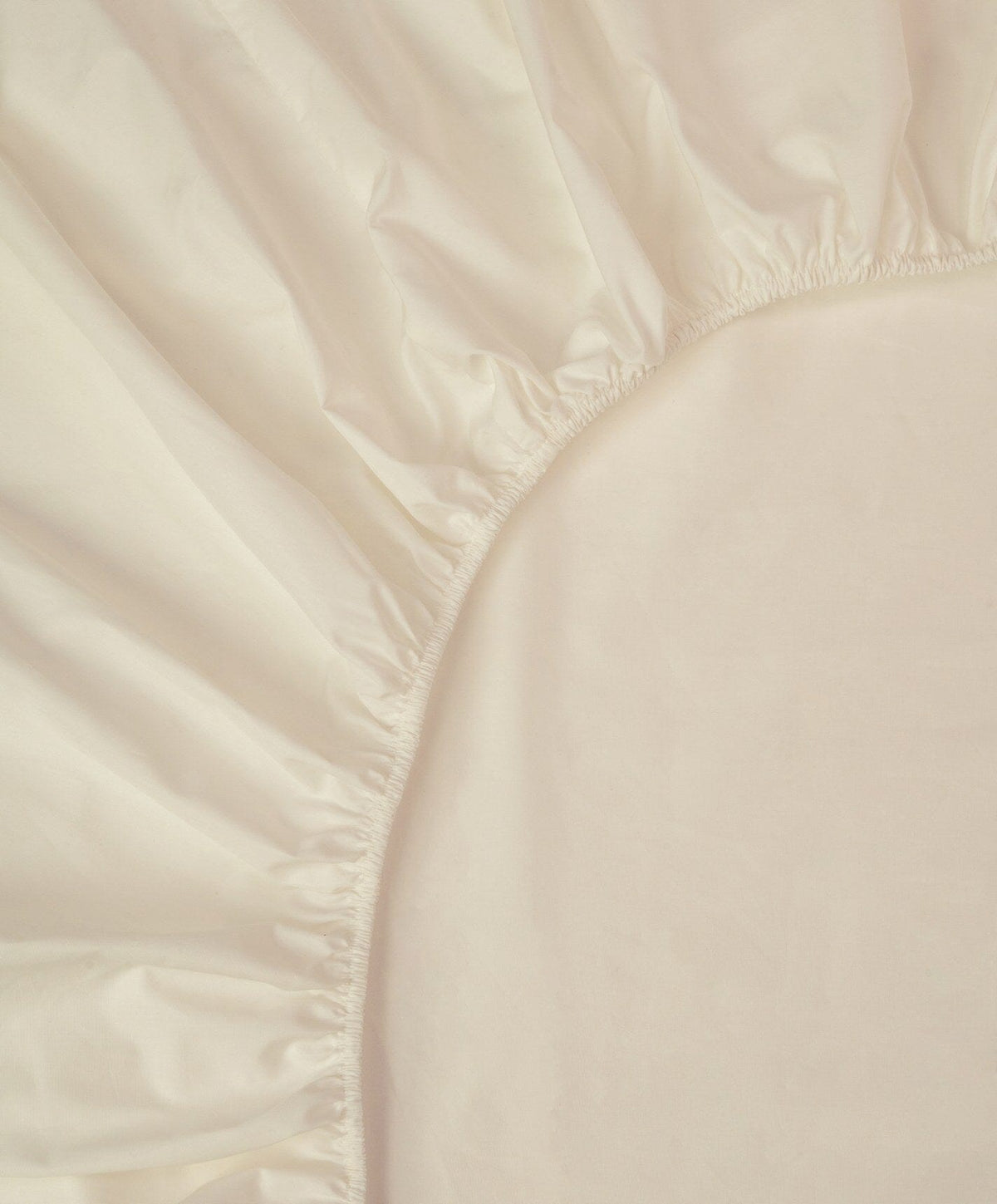 Percale Fitted Sheet by Fable Home, shown in Birch Sand.
