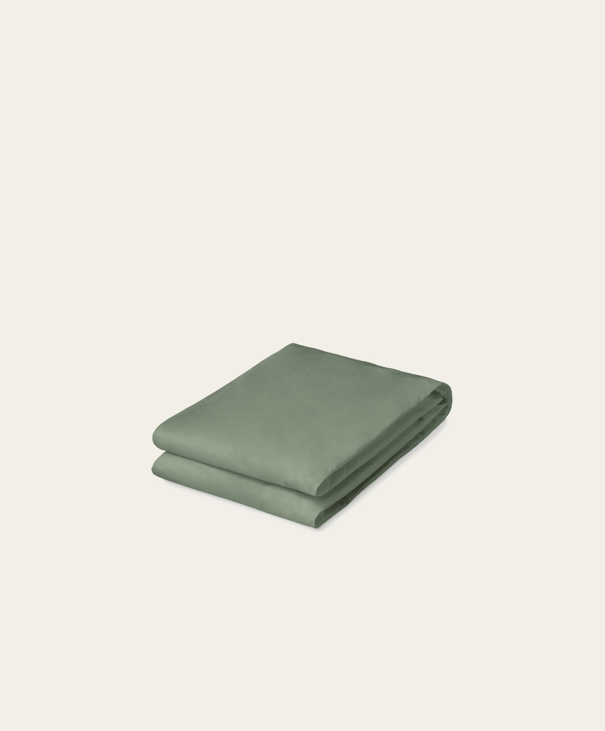 Percale Fitted Sheet by Fable Home, shown in Juniper Green.