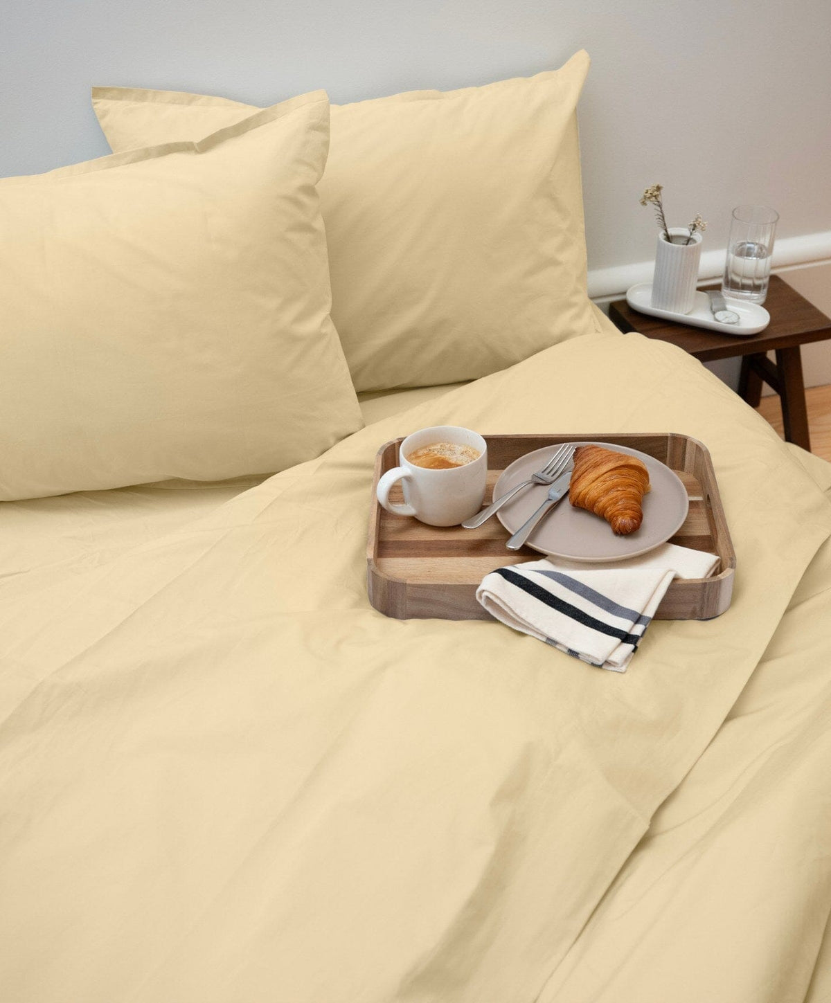 Percale Flat Sheet by Fable Home, shown in Buttercup Yellow.