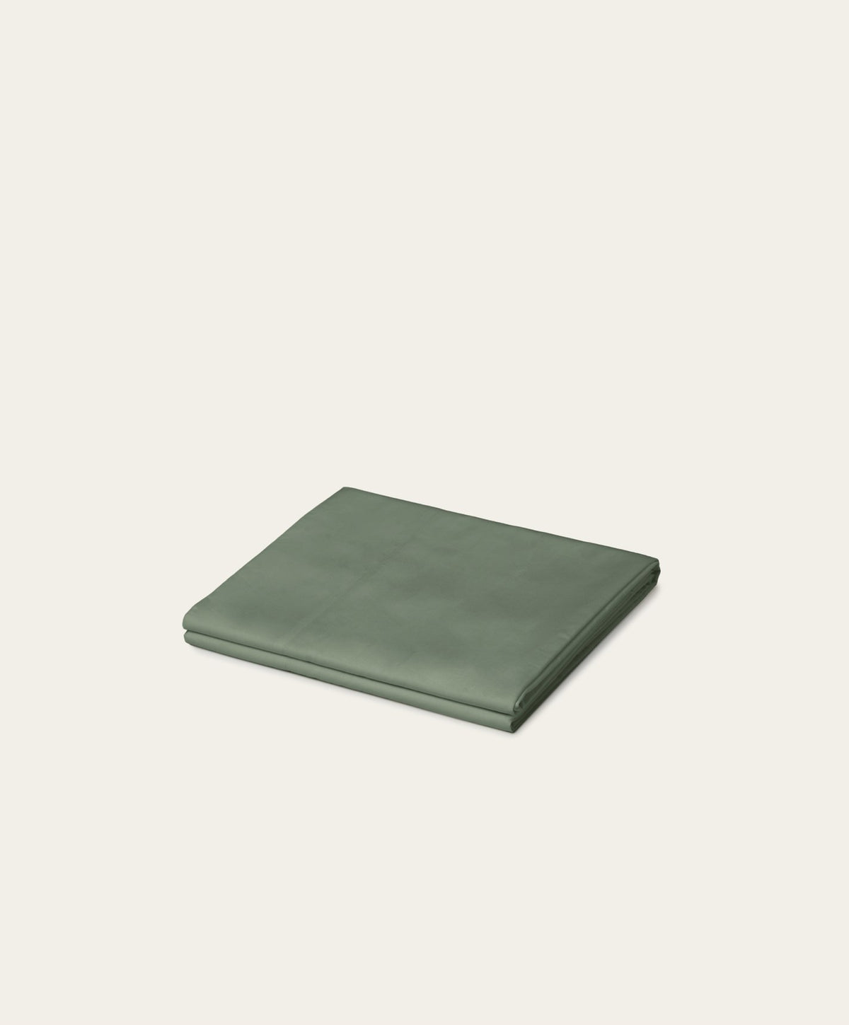 Percale Flat Sheet by Fable Home, shown in Juniper Green.