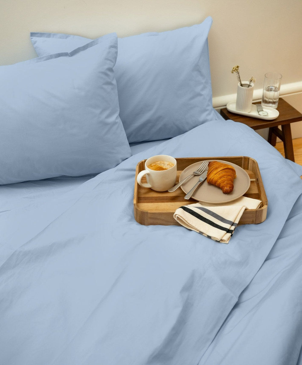 Percale Pillowcase Pair by Fable Home, shown in Meadow Blue.