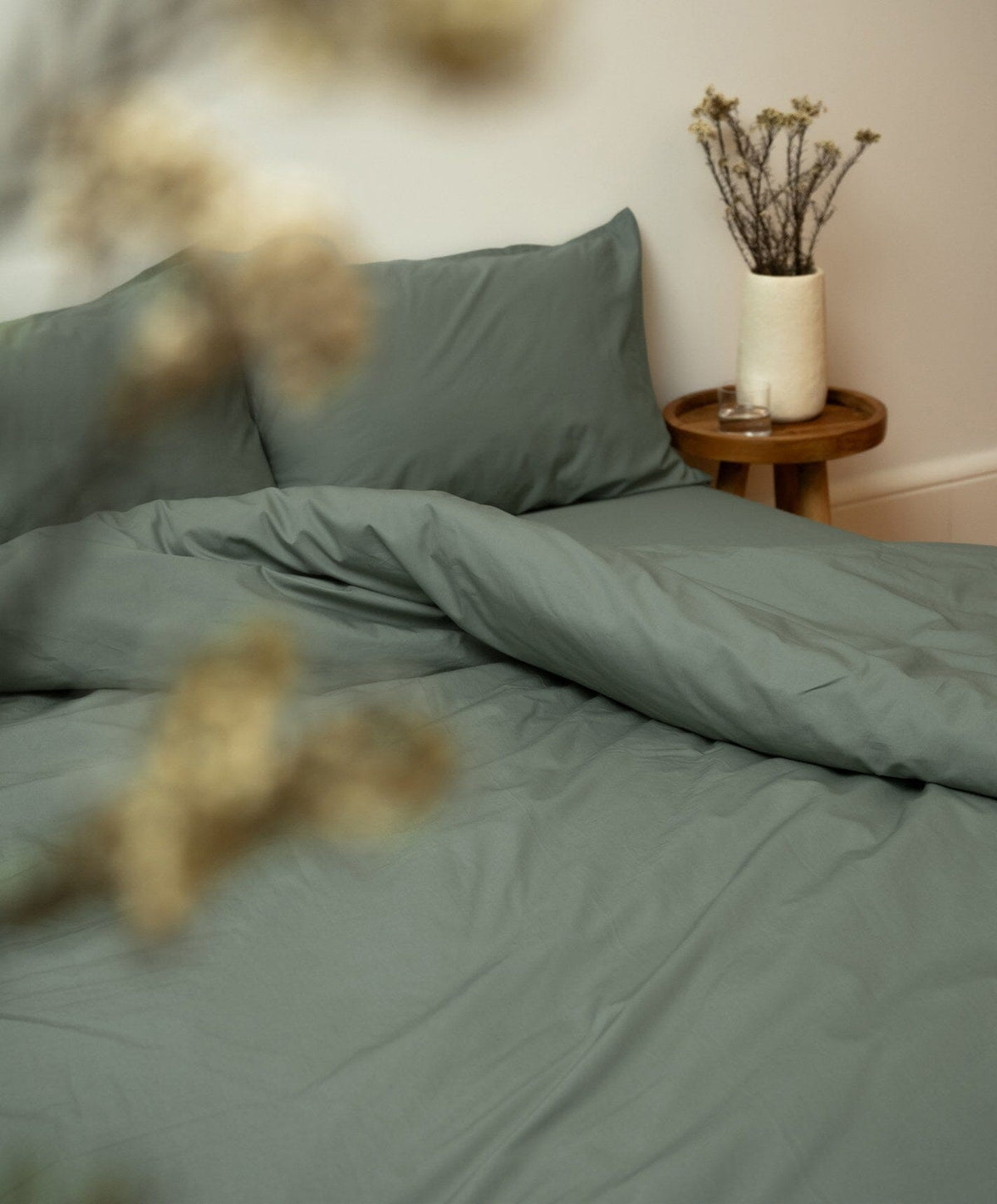Percale Pillowcase Pair by Fable Home, shown in Juniper Green.