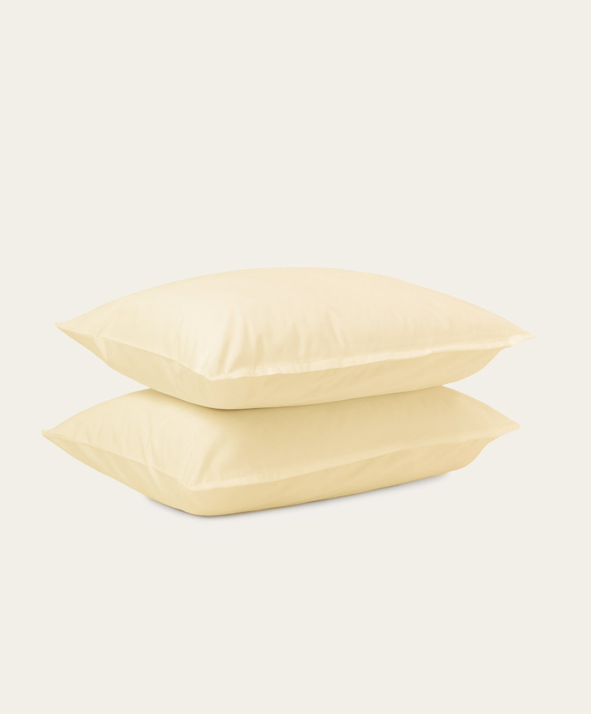 Percale Pillowcase Pair by Fable Home, shown in Buttercup Yellow.